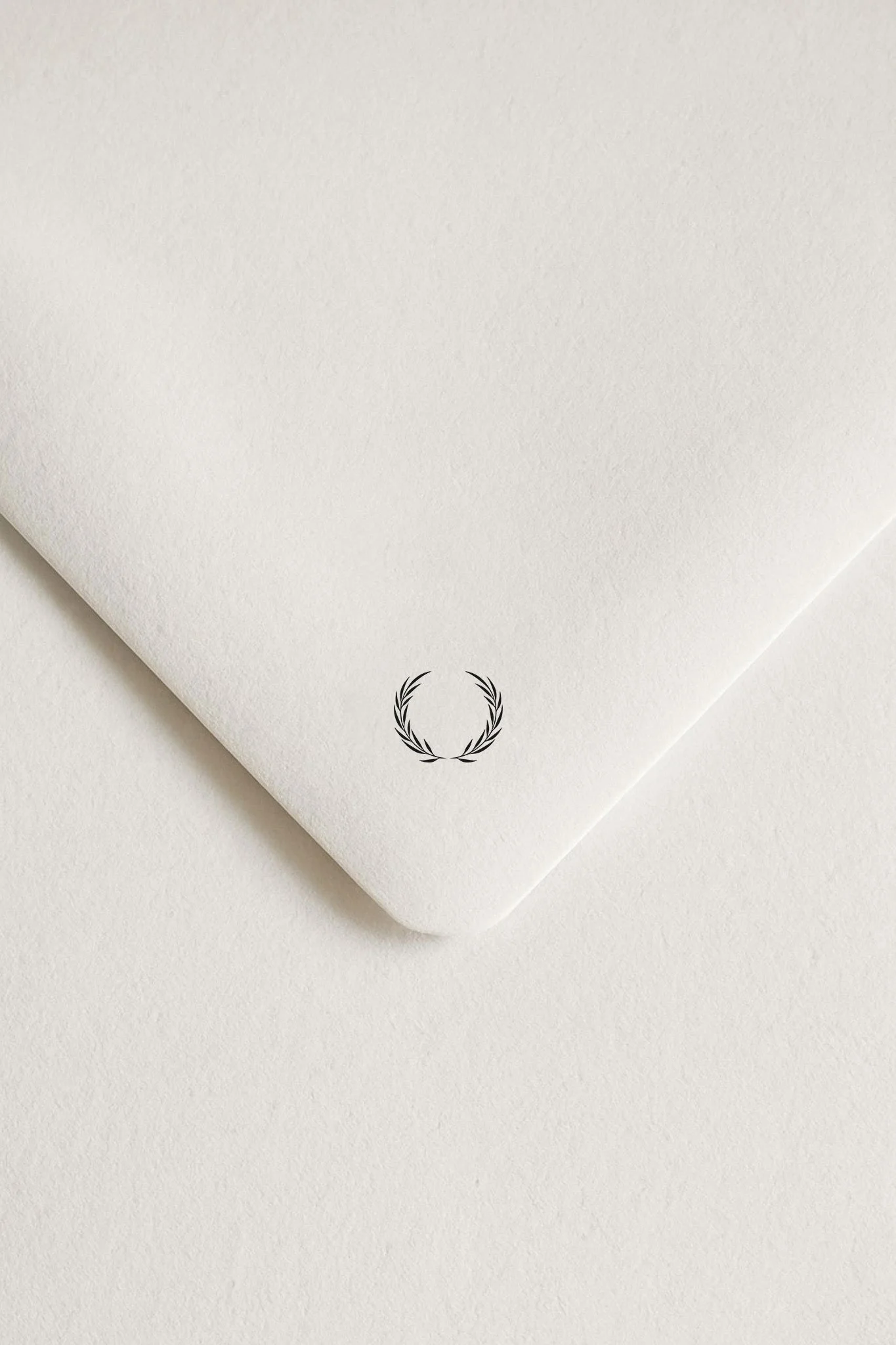 Logomark application for stationery and brand collateral.