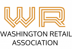 Close-up of the letters 'VR' in a stylized, orange outlined font on a black background.