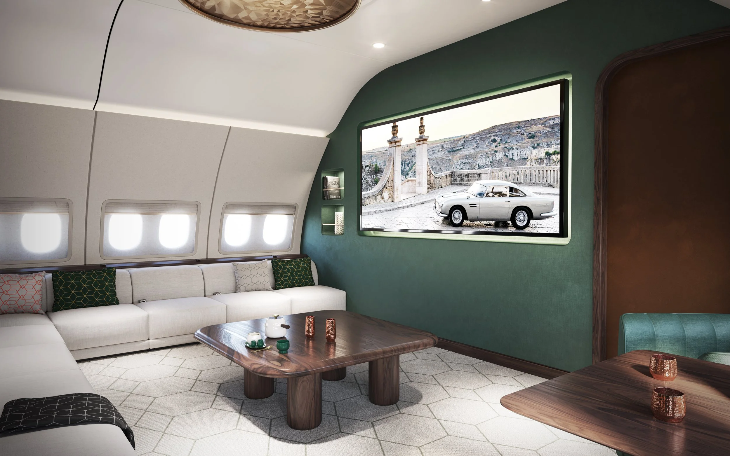 Luxury modern lounge designed by Sarah Larranaga with white sectional sofa, wooden coffee tables, decorative pillows, built-in bookshelf, and large window showing a classic silver car parked outside with a scenic landscape in the background.