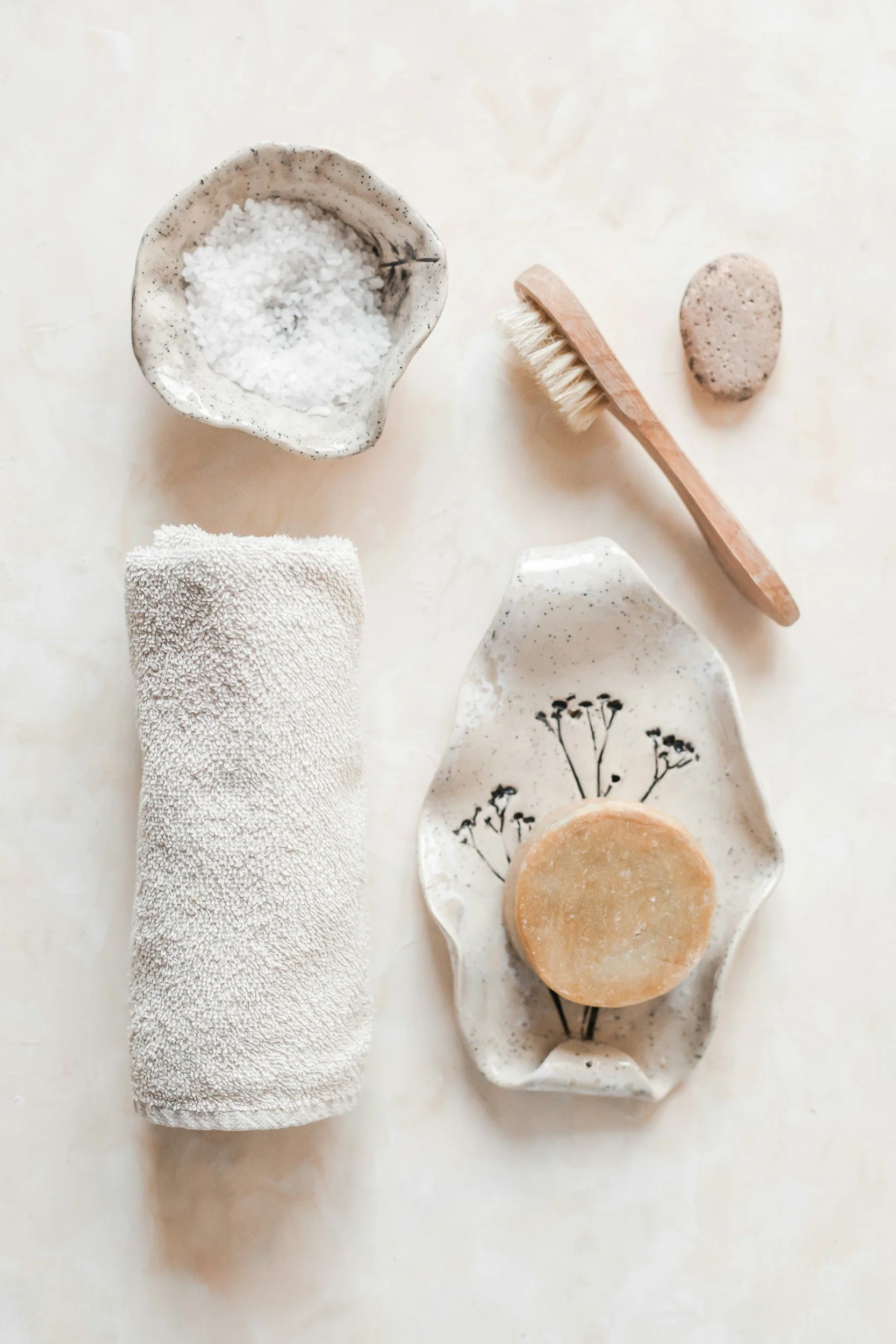 White and wooden spa tools