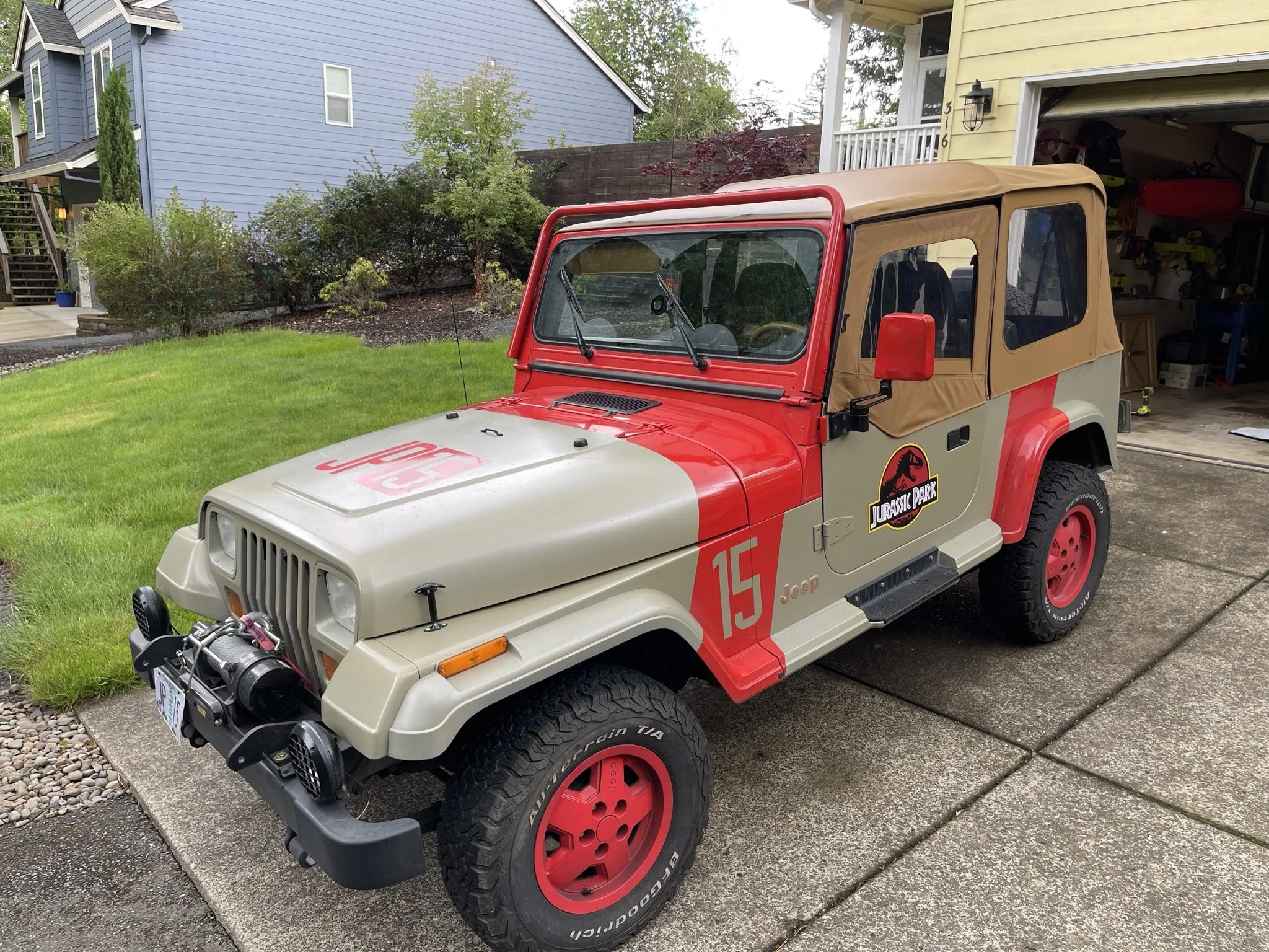In June 2022, I bought a soft top kit and installed a canvas top for the first time in the Jeep's life. At first, I would swap the hard top back on for the winter months, but the past few years I've left the soft top on year-round. 