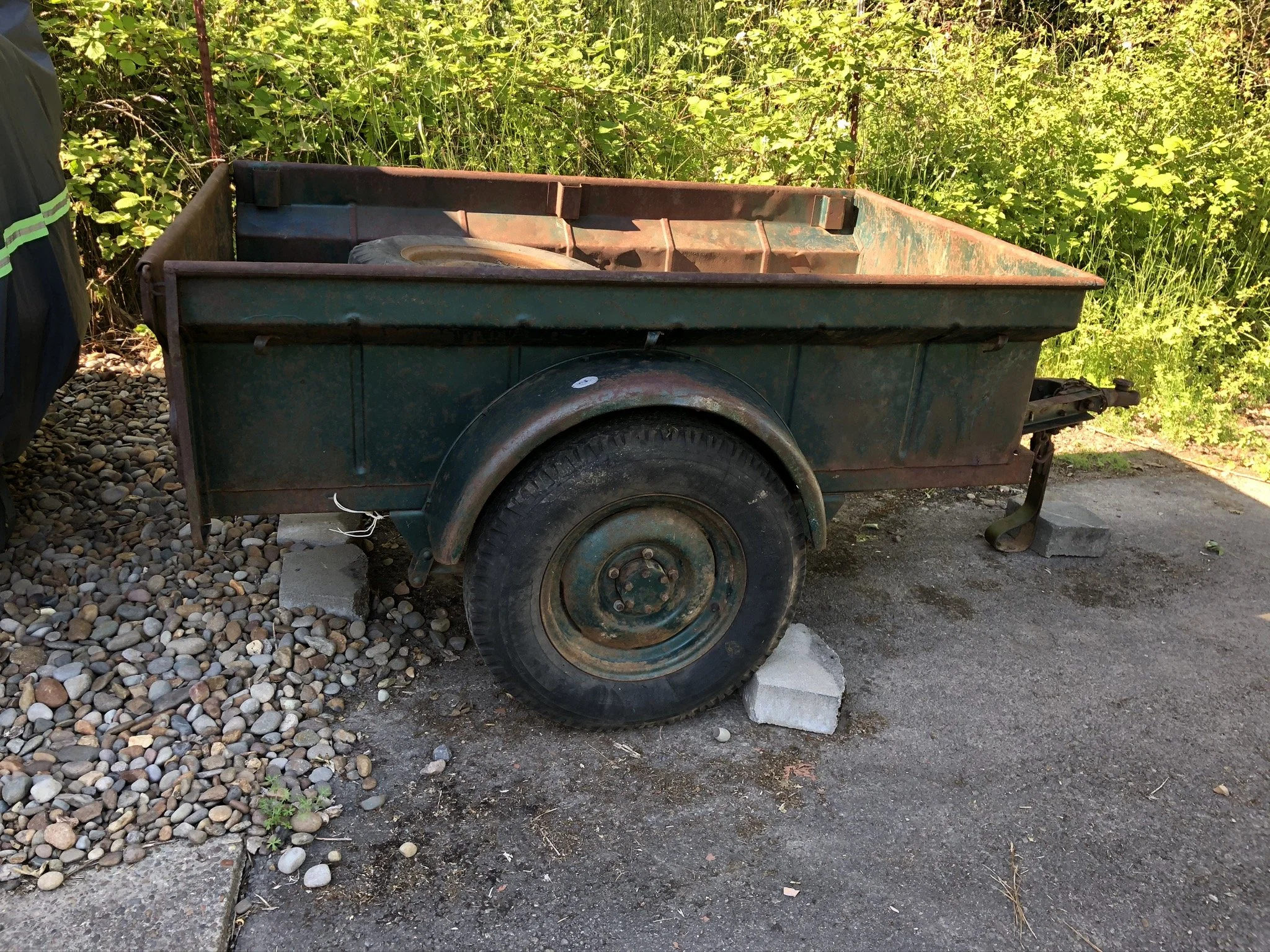 The trailer as it sat after digging it out of the brush and bringing it home.