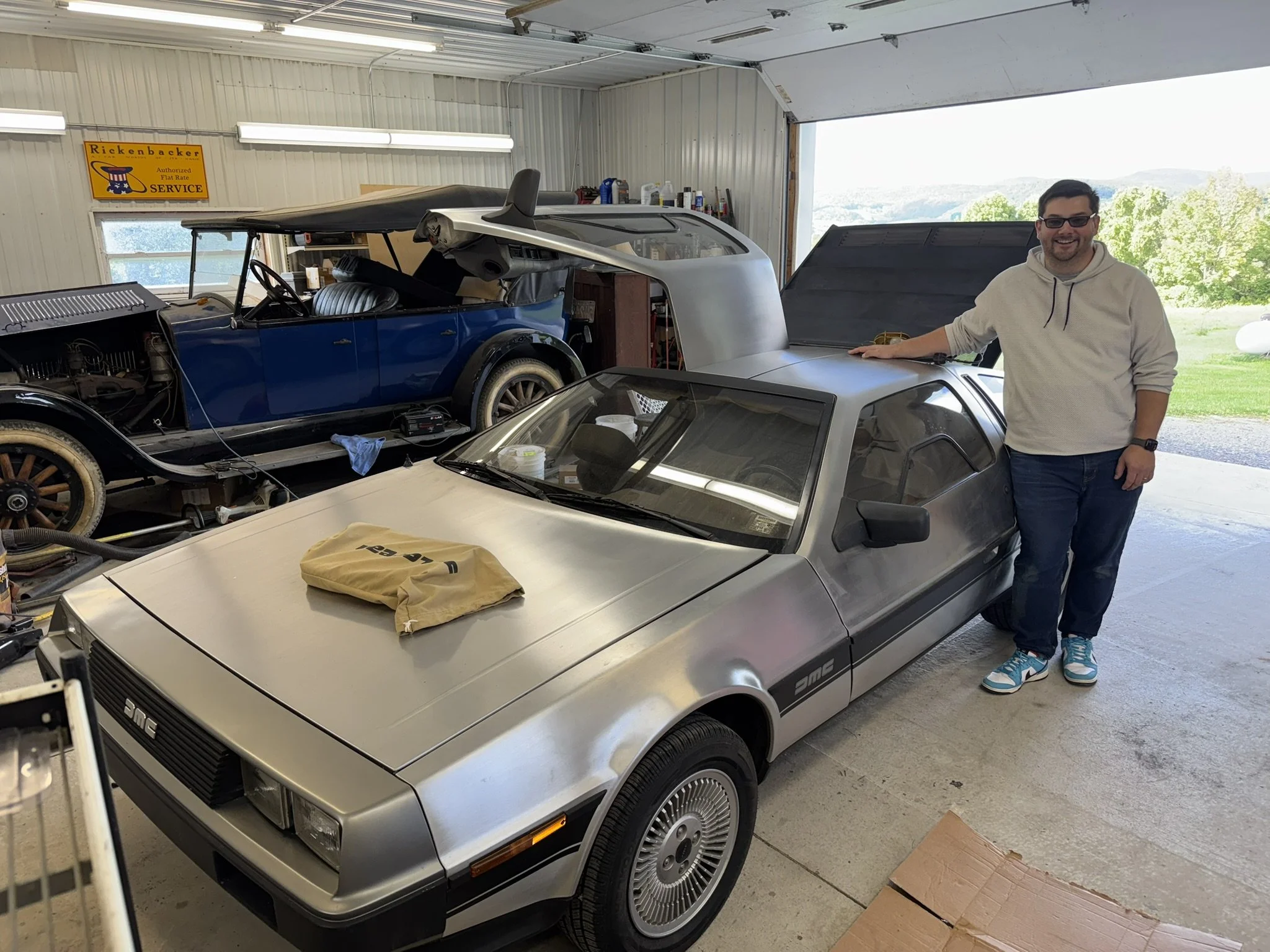 Standing next to my dream. My glasses were hiding the tears. :)

The blue car in the background is a Rickerbacker luxury car from the 1920s, which had been in the owner's family since new. 