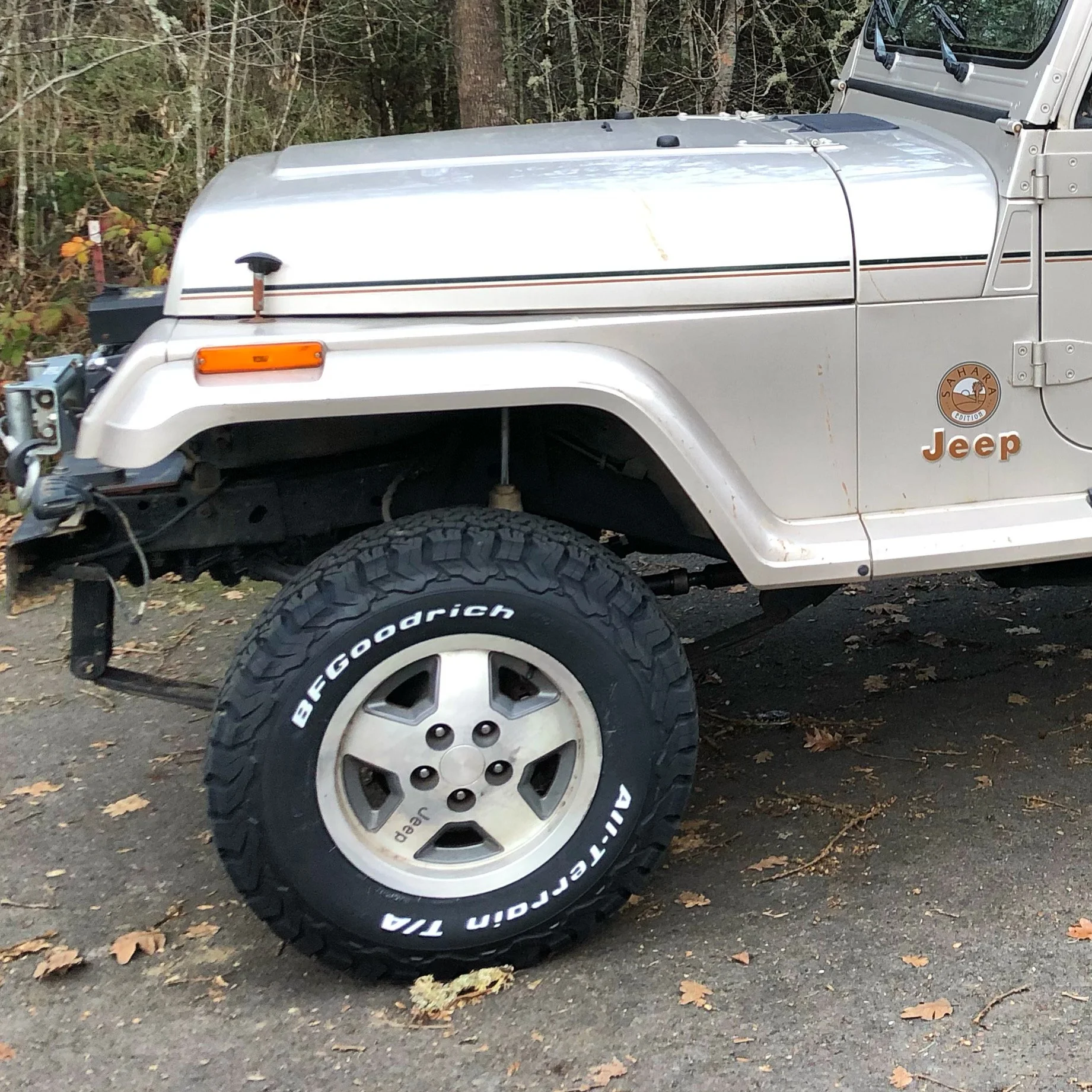 Screen-accurate OEM wheels were procured off Facebook Marketplace.