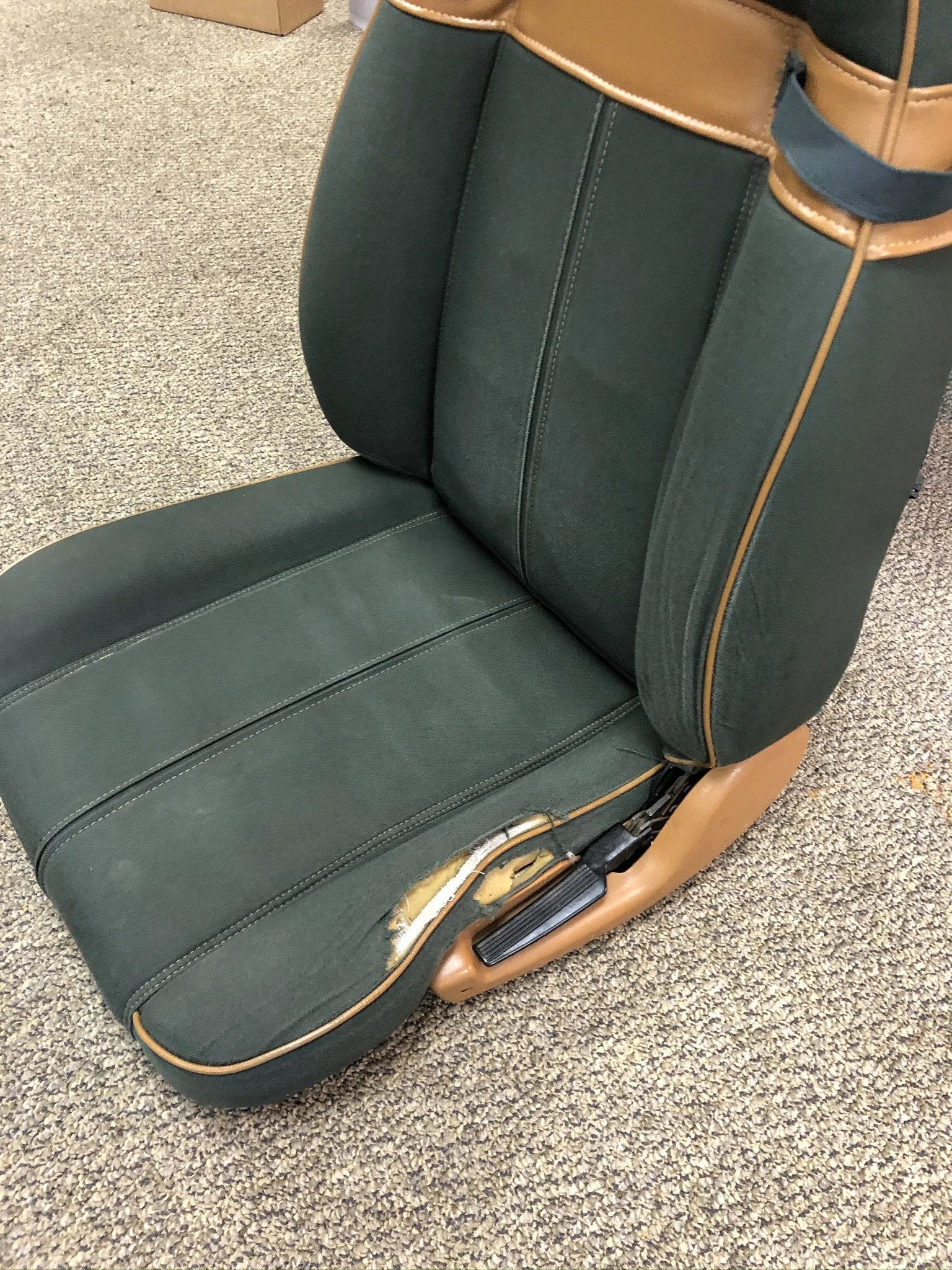 The rare Sahara seats were in good condition aside from this driver seat damage, a very common wear point in YJs. 