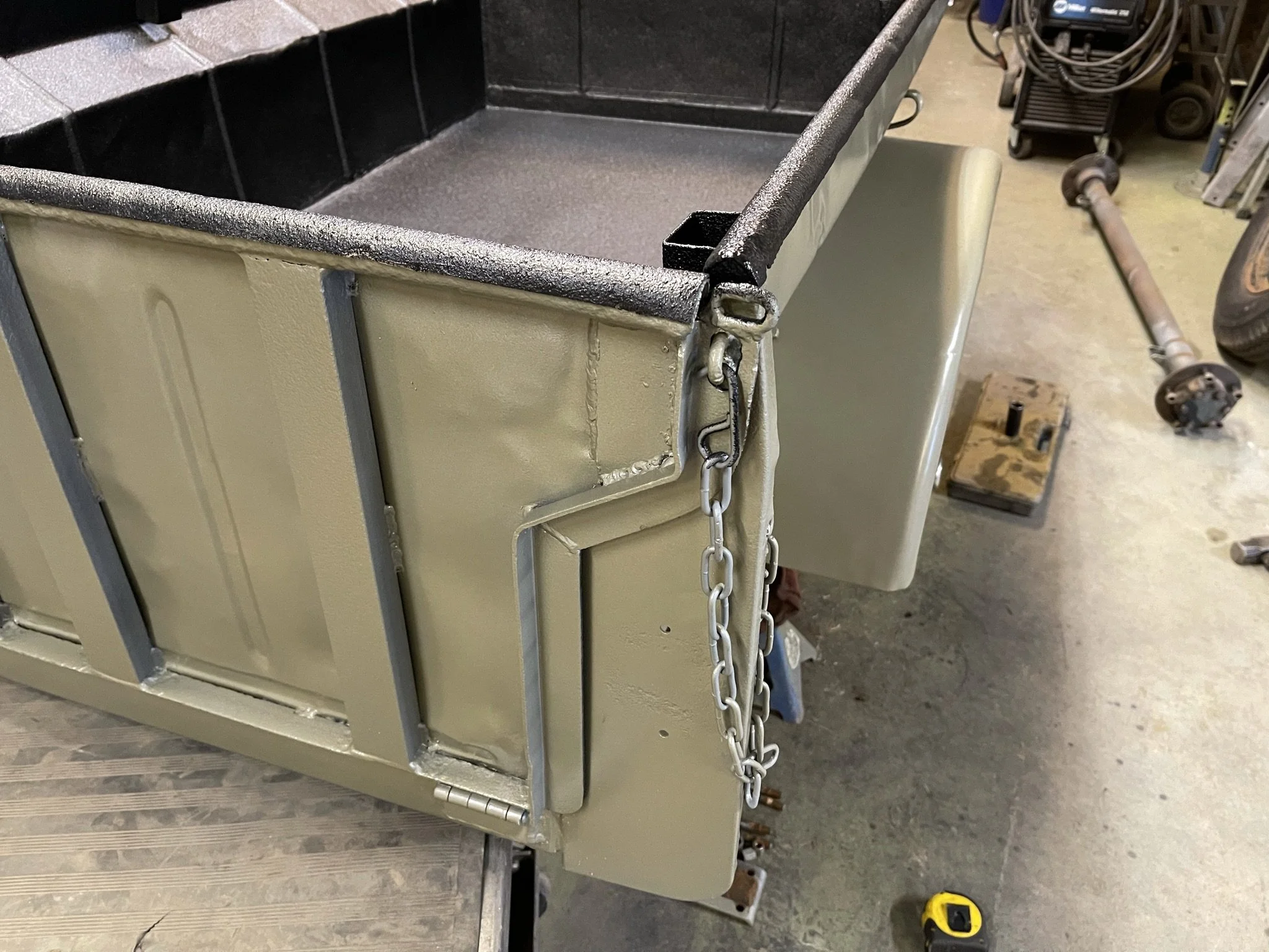 New chain was added to hold the tailgate level when dropped. I changed the hooks to carabiners so they wouldn't loosen with bouncing.