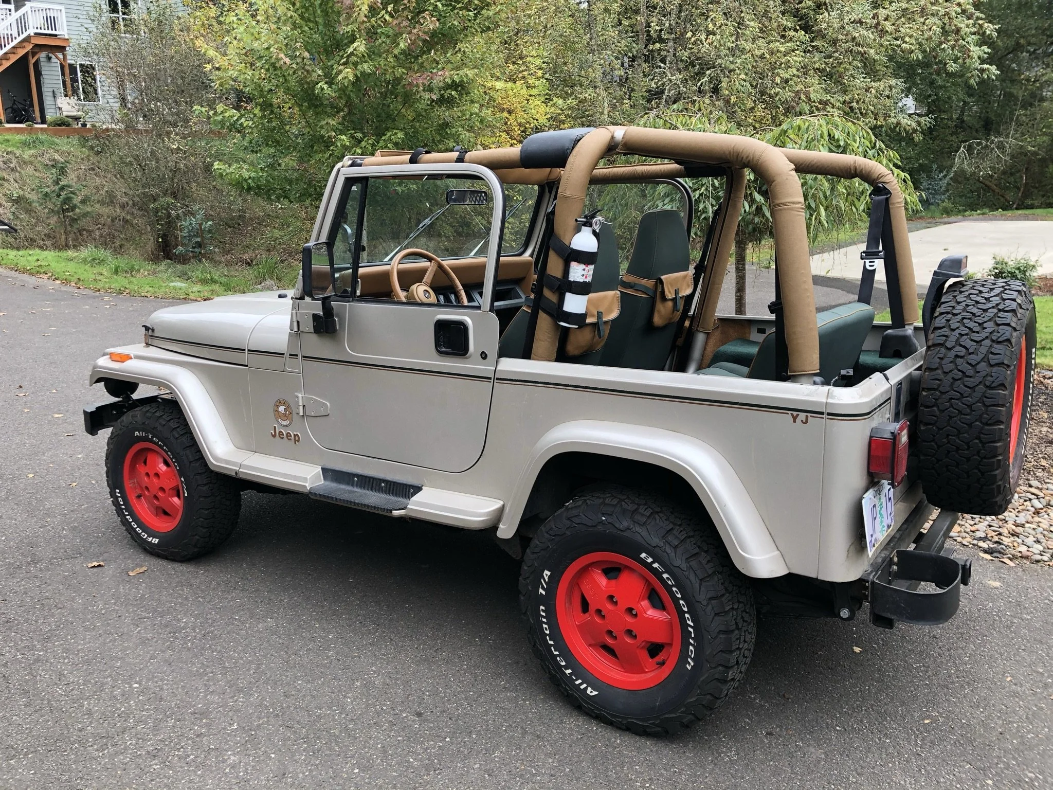 I painted the wheels myself using lots of sanding, spray paint, wet sanding, more paint, and clear coat. 