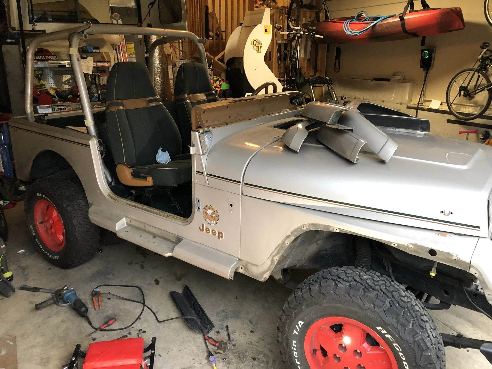Beginning the teardown process before going to the body shop. Removing accessories, fenders, windshield, etc myself saved a lot of cost compared to the shop doing it. 