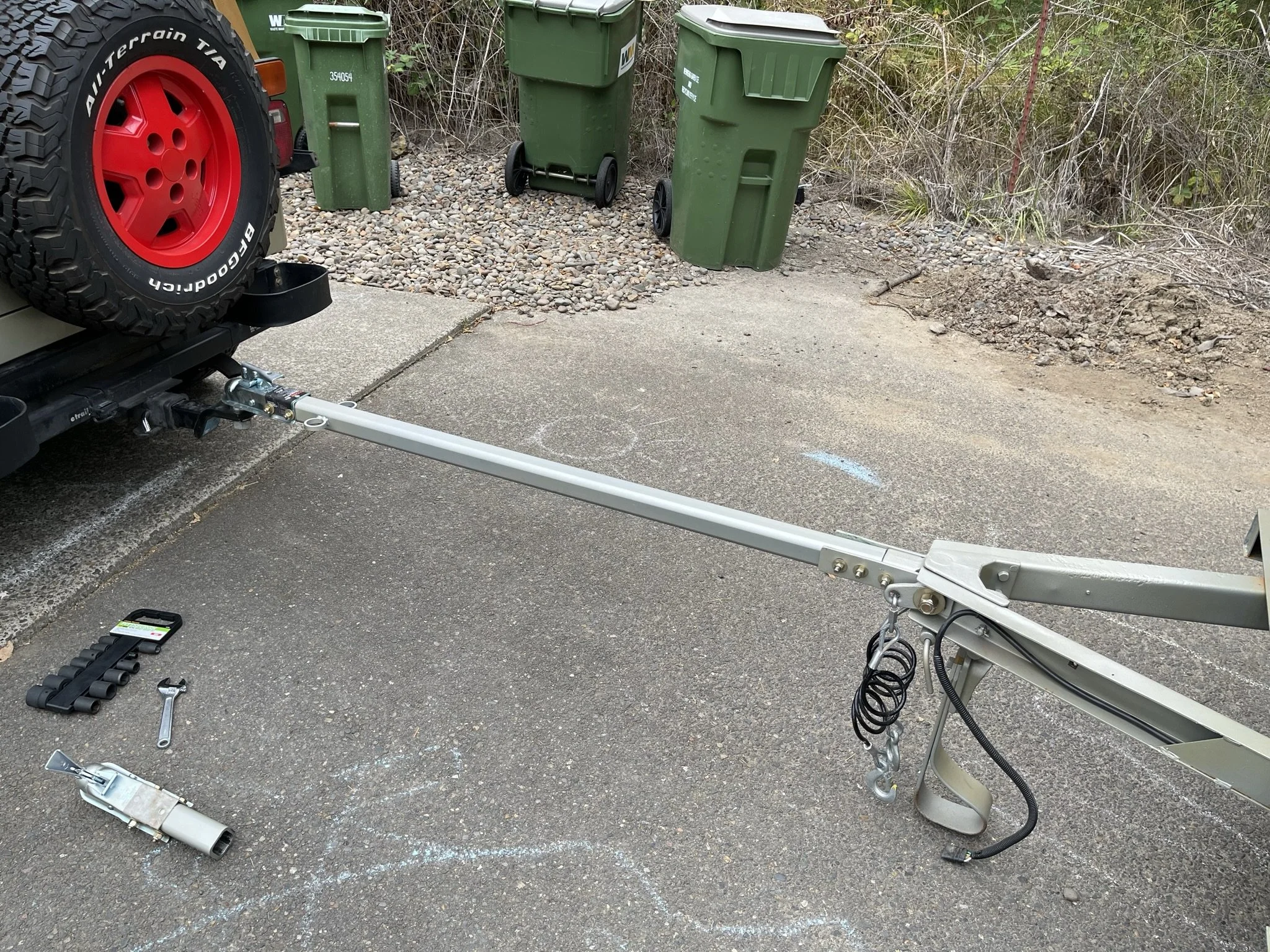 Extended mode: safety chains move up to new anchors and an extended length electrical connection is swapped on. 