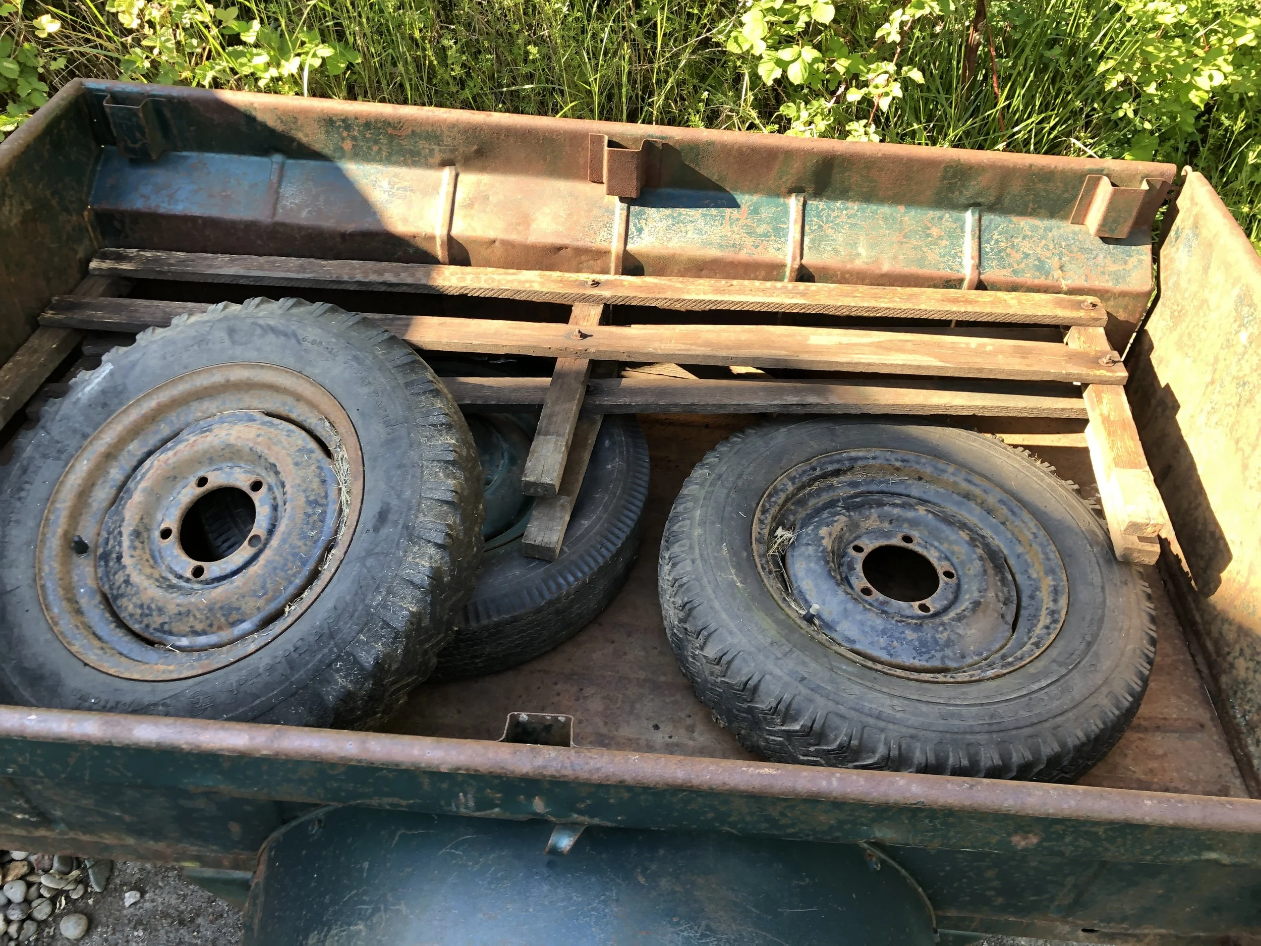 Check out those tires! A couple of ones I could date were from the early 1950s. I sold the extra wheels to a Willy's Jeep restorer.
