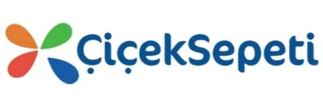 ÇiçekSepeti logosu, renkli çiçek sembolü ve mavi yazı.