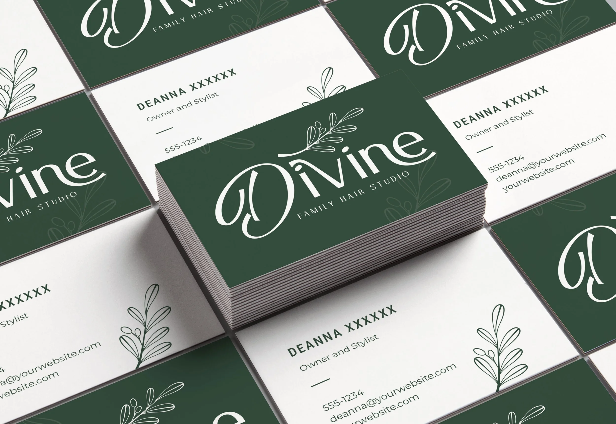 Mockup of a logo that says ""Divine Family Hair Studio" on a bunch of business cards.