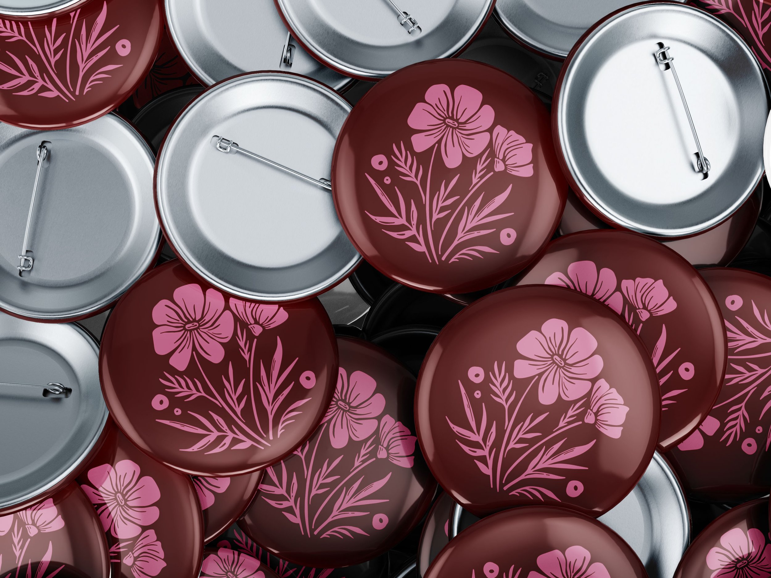 Mockup of a pile of button pins each one has a maroon red background with a pink floral illustration on it