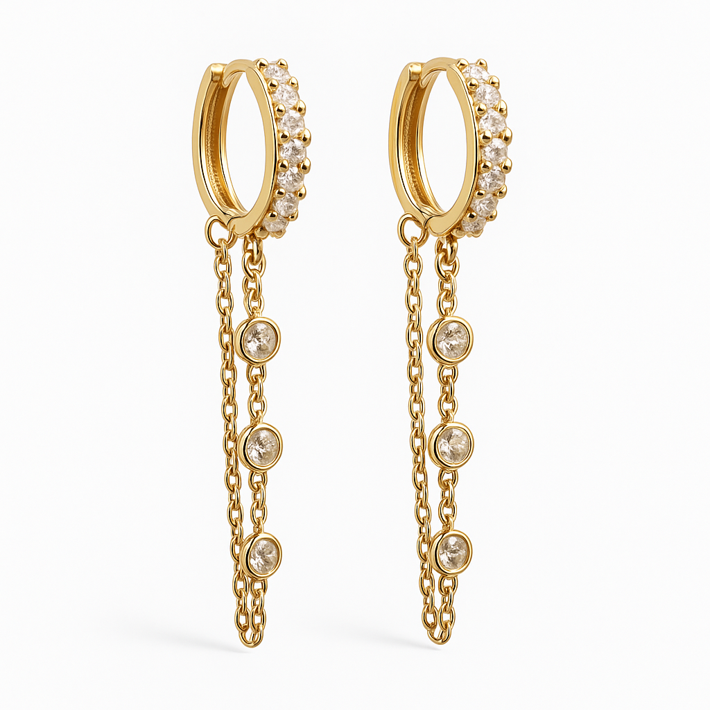 Gold chain earrings with dangling chains and embedded diamonds.