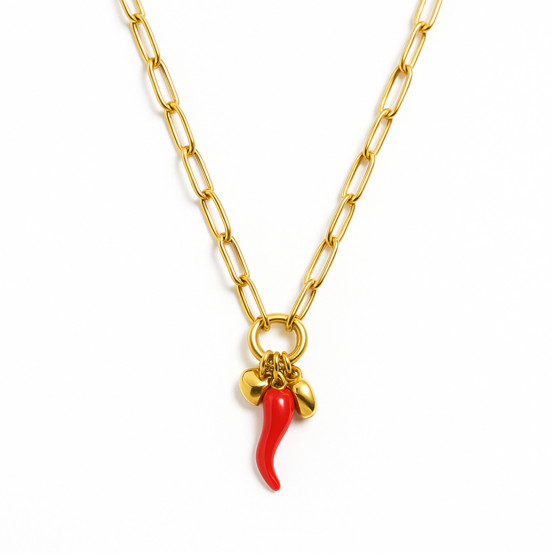 Gold chain necklace with a red chili pepper charm.