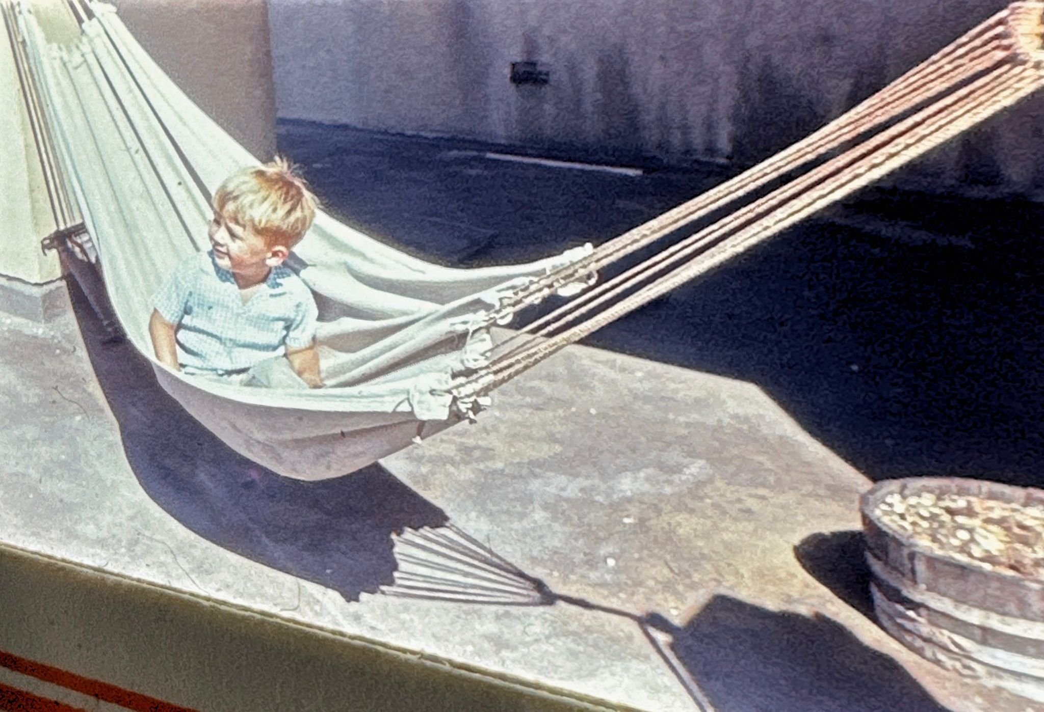 ' My cousin in a hammock on the roof of Number 5 where we spent many happy times! ' Courtesy of Fiona Hunter 