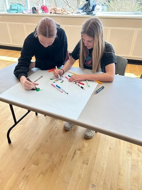 Youth athletes completing a mental skills training activity