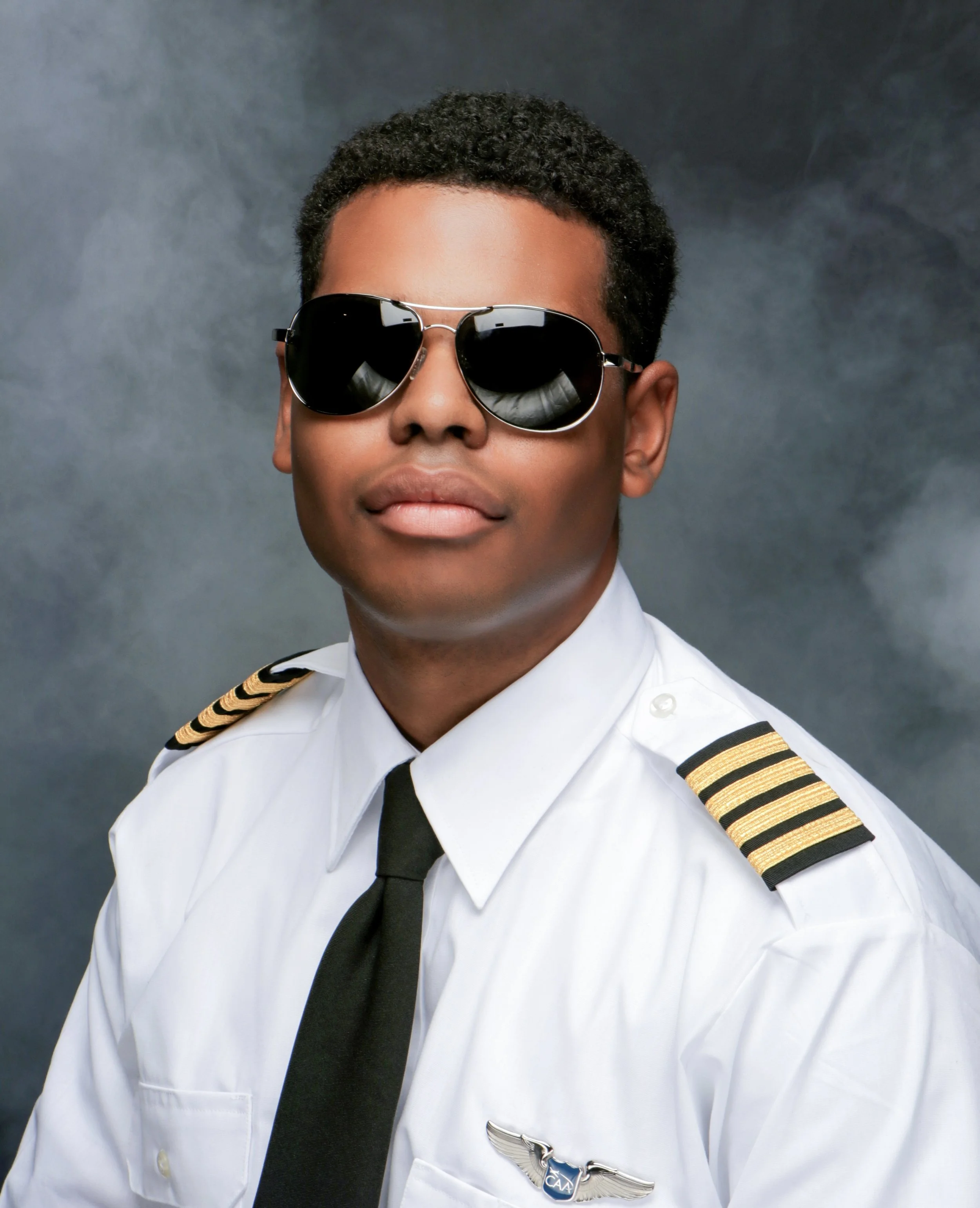 I am wearing my uniform with stripes and sunglasses