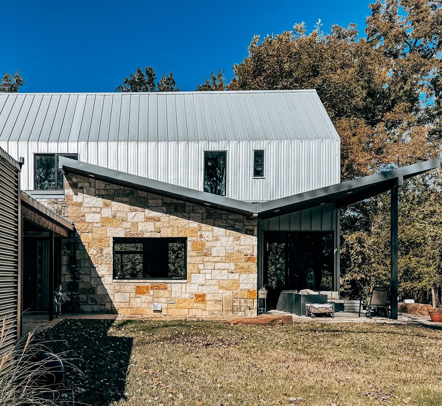 This butterfly roof and window placement harmonize and balance materials, angles, and proportions in this home. It&rsquo;s started with a sketch and ended in a structure that embodies intentional and beautiful design. We can guide you through the ent