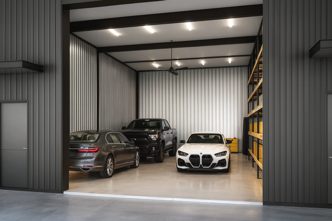 Storage condo interior with three vehicles parked side by side