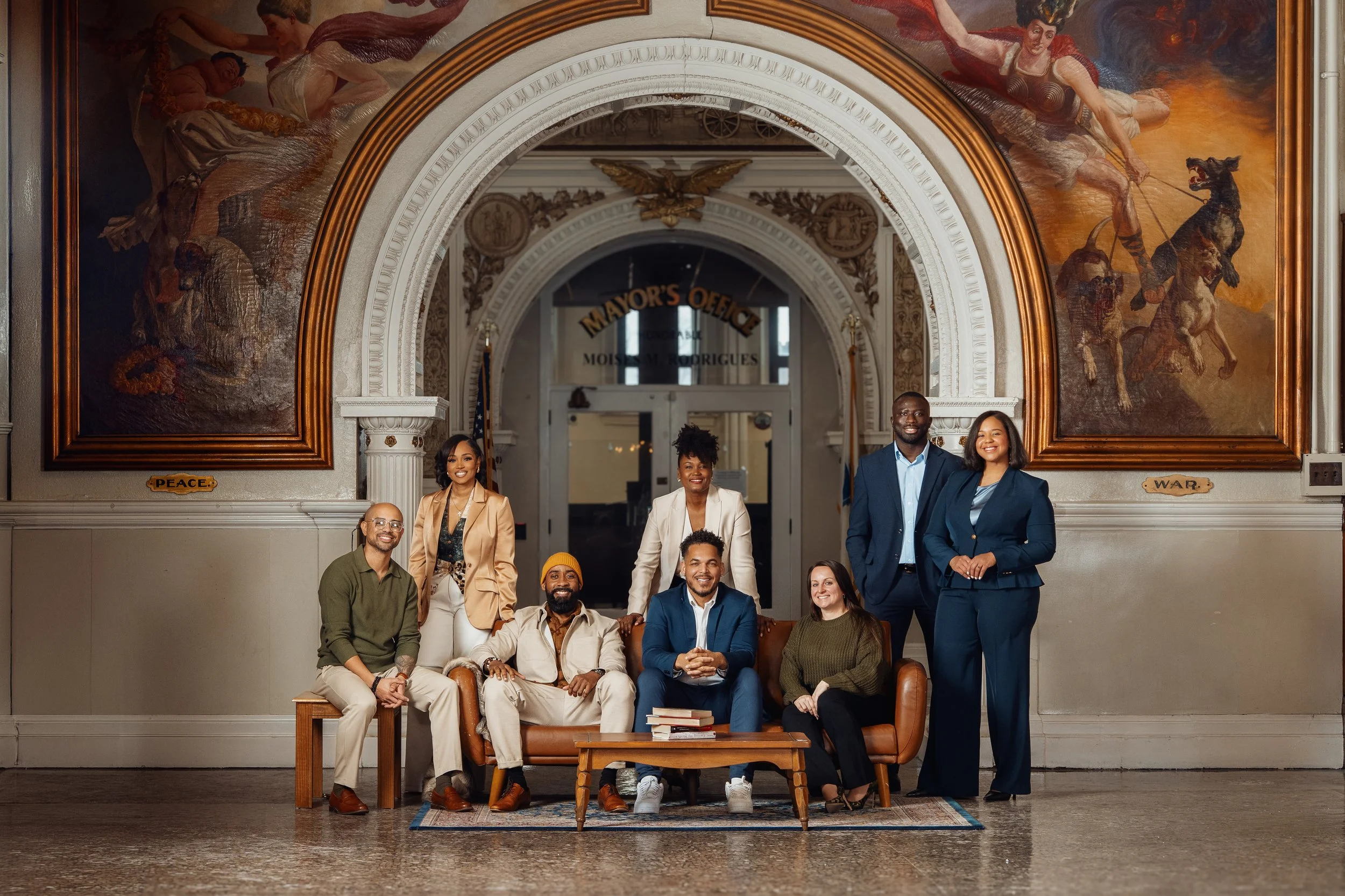 The Freshman Class 26 Cohort, Nelson Fernandes, Dr. Ellie Paris, Francois & Iraimi Diatta, Salo Afonseca, Katie Balboni, Rui Lopes and Veronica Thompson at City Hall.