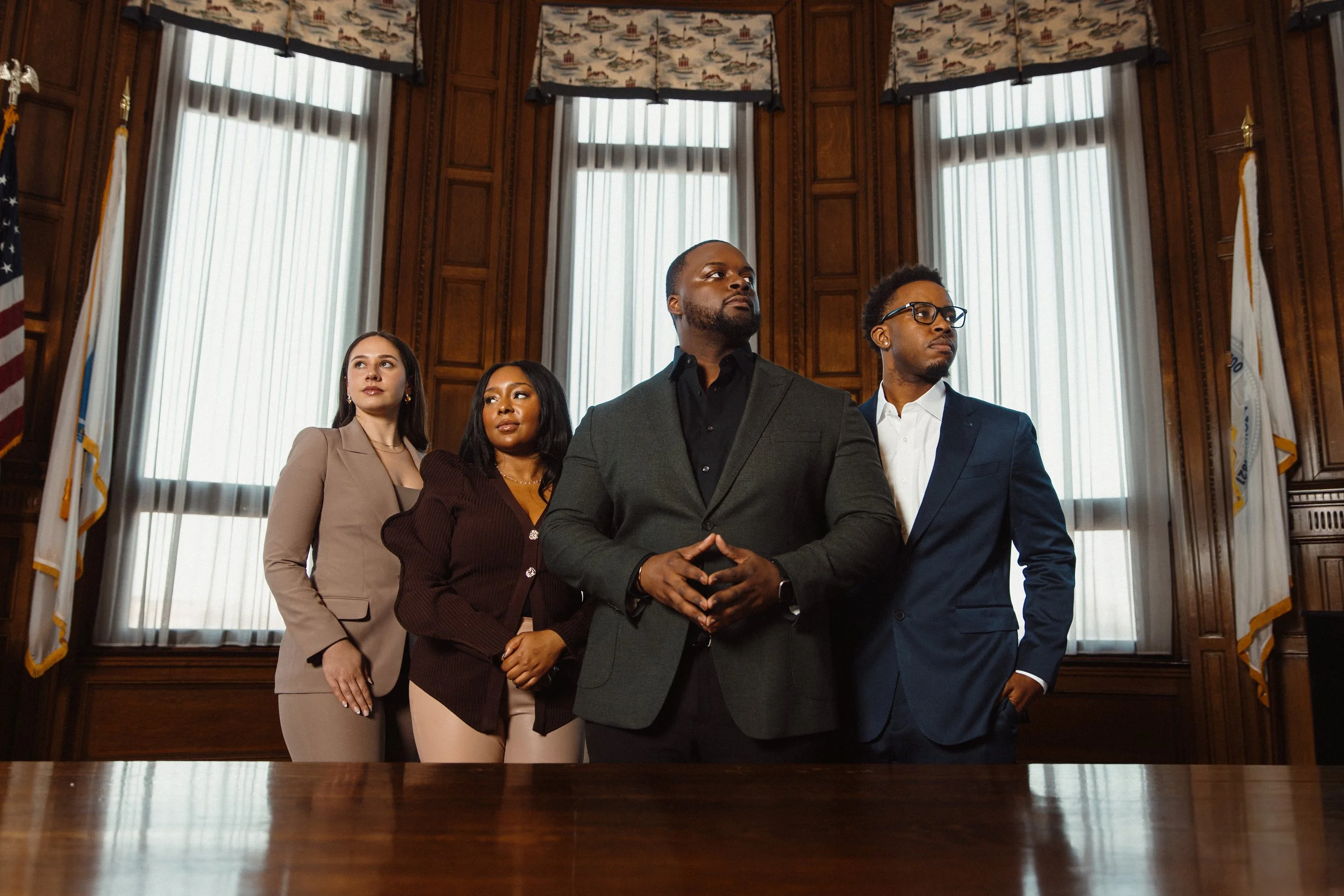 The Greater Brockton Young Professionals Executive Board posing in Brockton City Hall. Myah Powers, Sarah Idieu, Isaiah Thelwell and Randy Jean-Francois