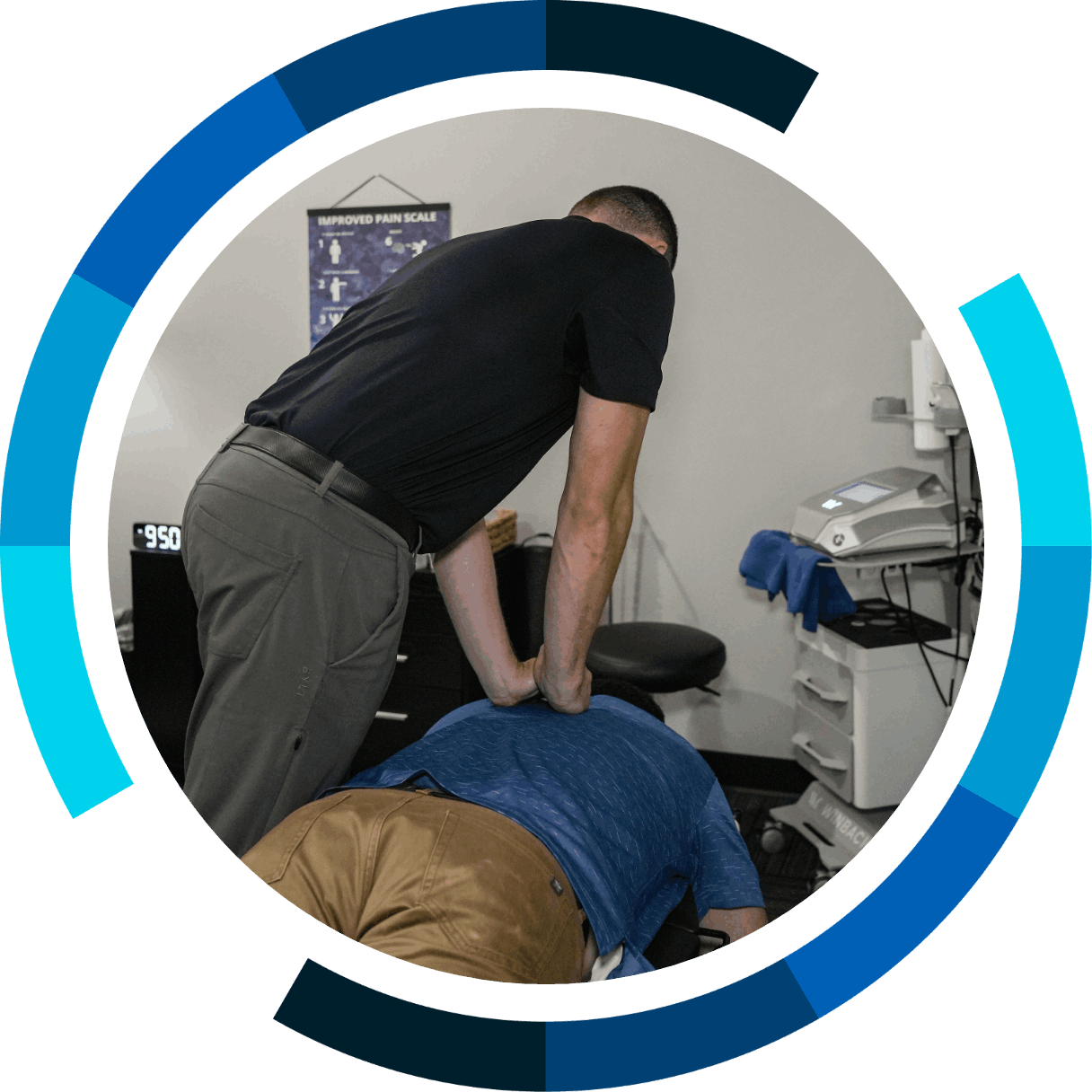 A person performing CPR on a patient lying face down on a table in a medical setting.