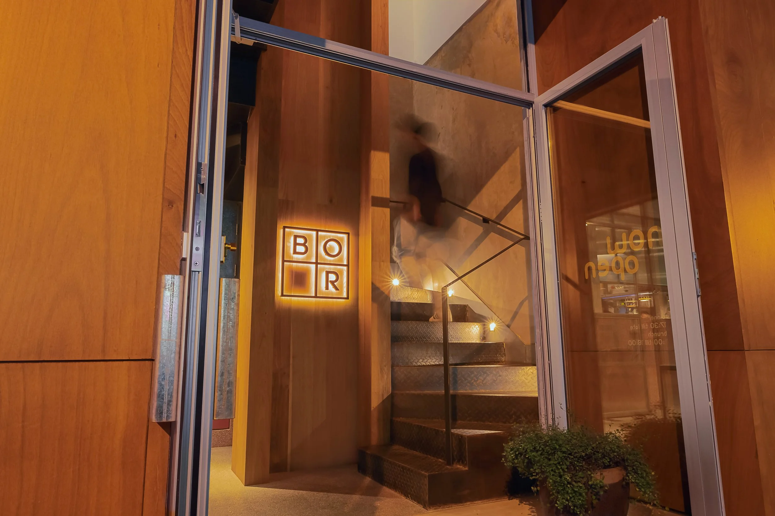 Entrance of BOR Eatery highlighting the establishment's signage and architectural details