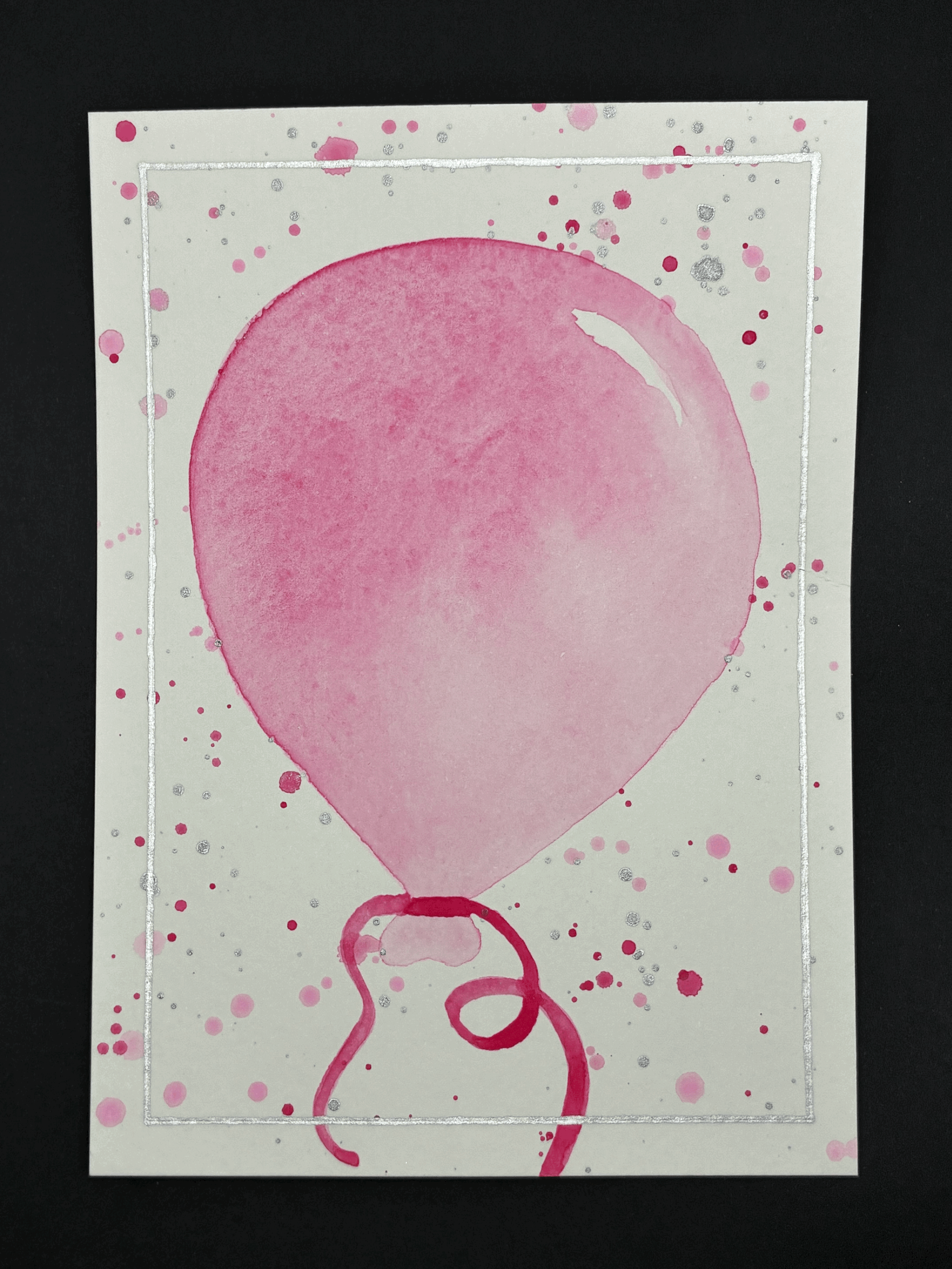 Pink/silver balloon