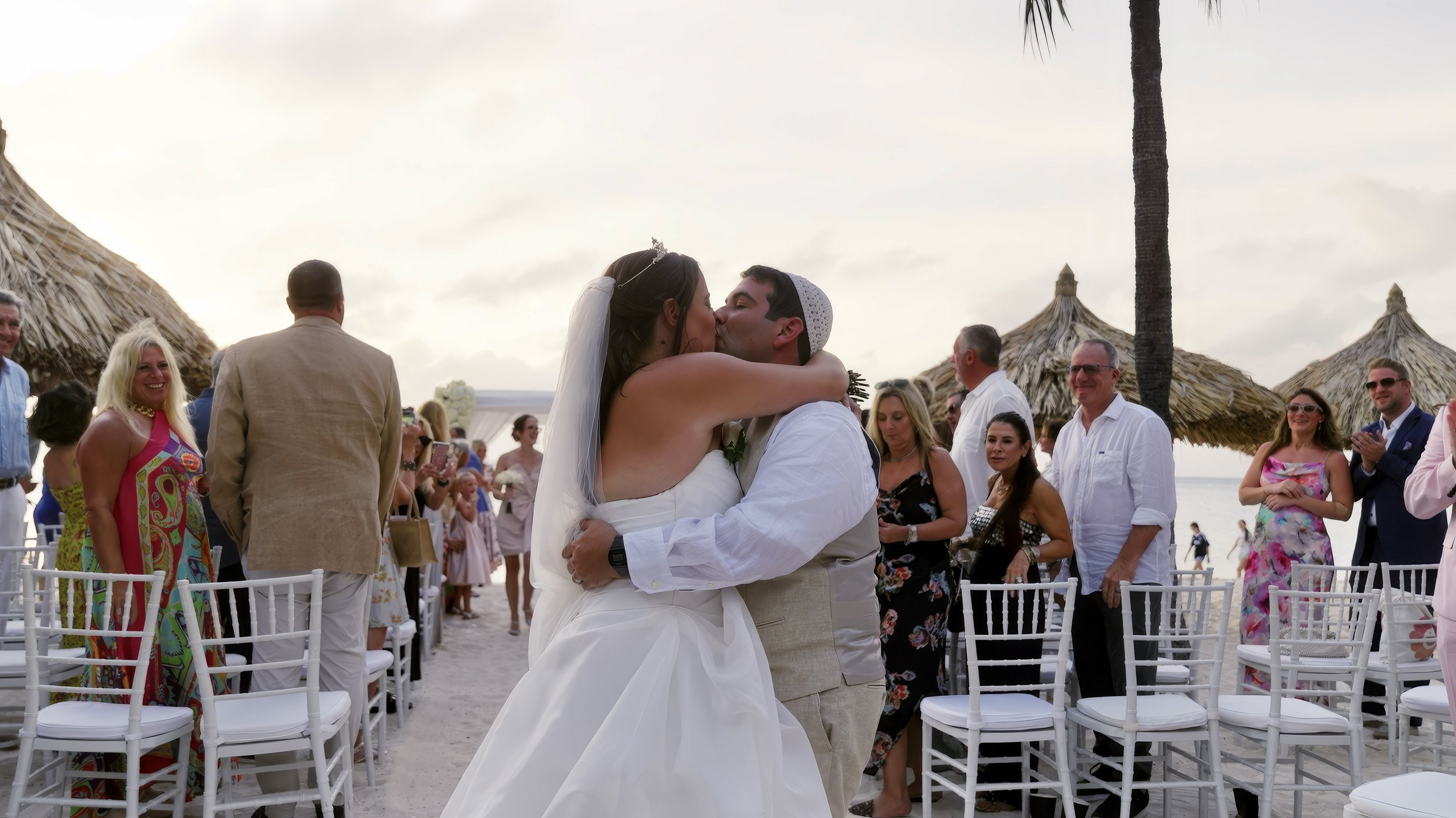 First kiss after the Jewish beach ceremony at Aruba Marriott Resort & Stellaris Casino