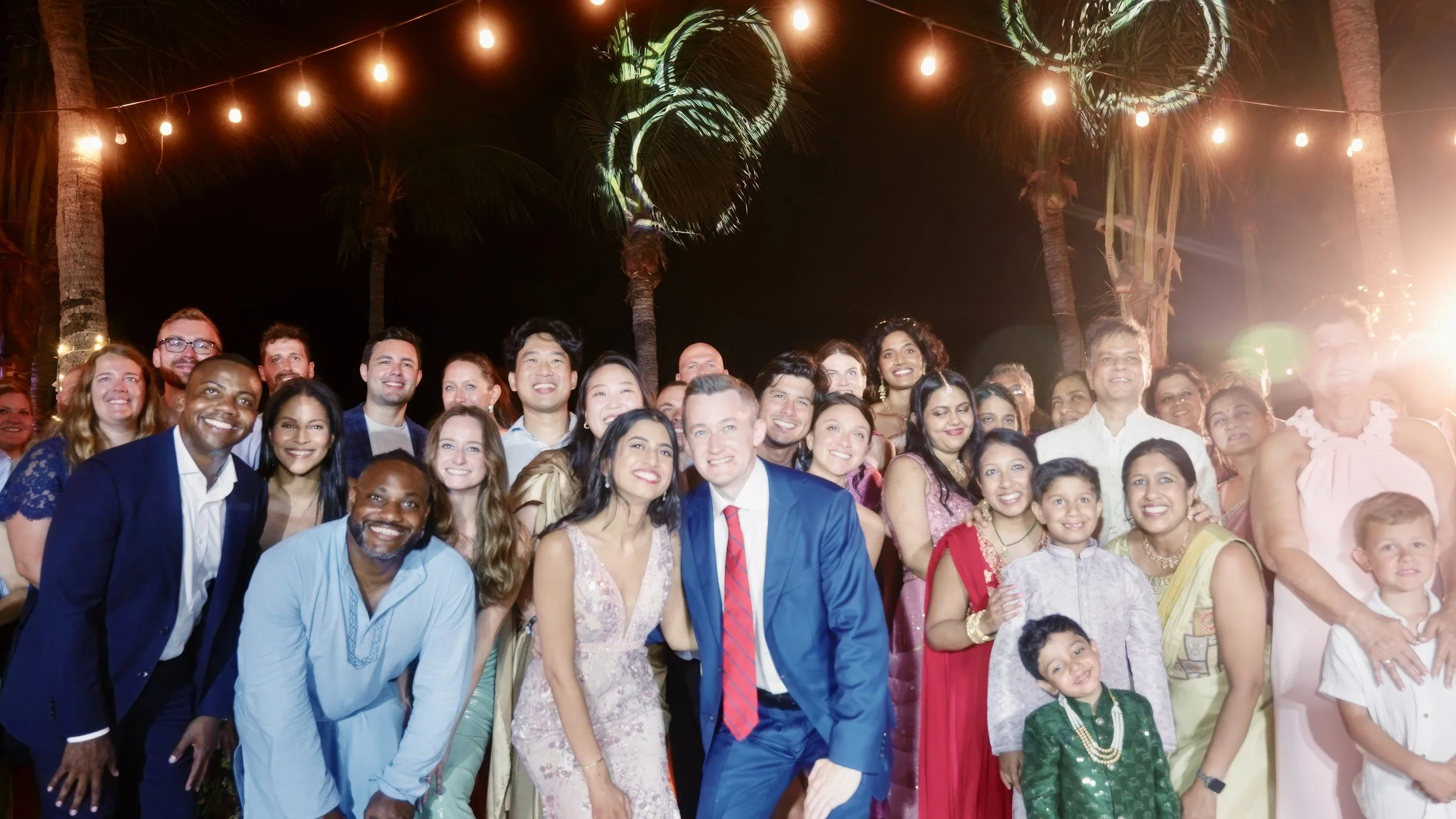 Aruba destination wedding guests celebrating at the island reception on Renaissance Private Flamingo Island, Aruba