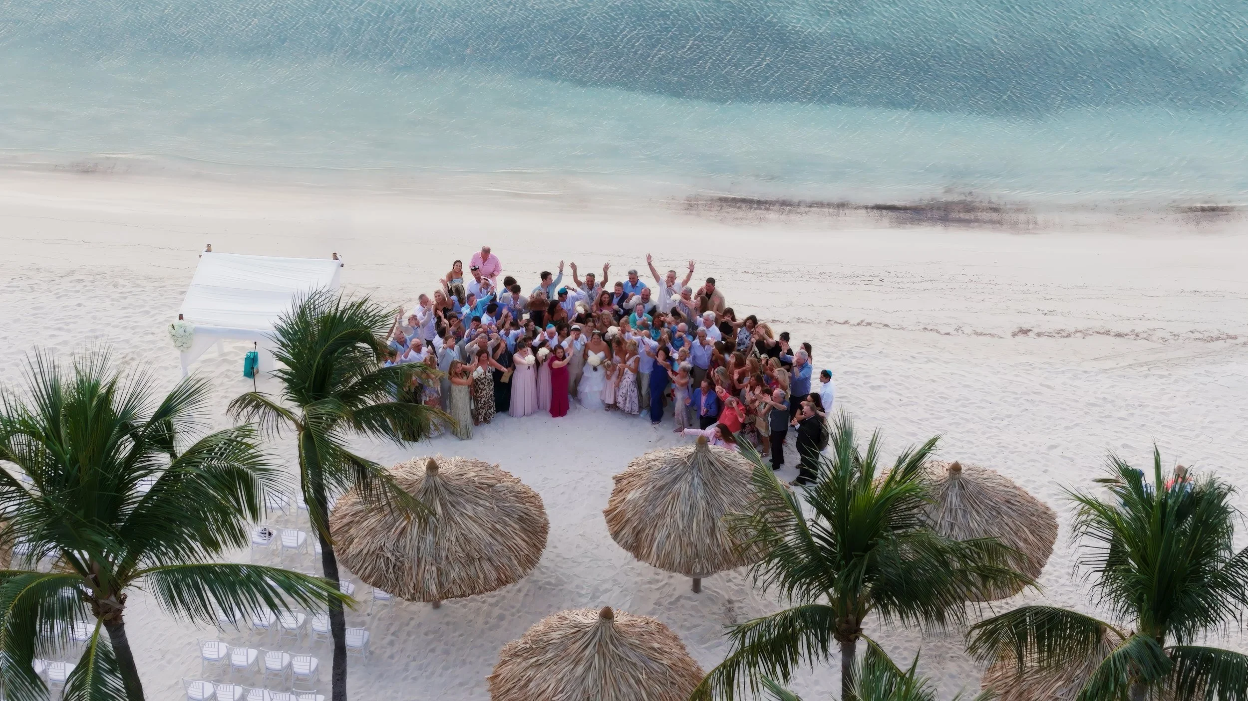 Aerial view of wedding guests on the beach at Aruba Marriott Resort & Stellaris Casino