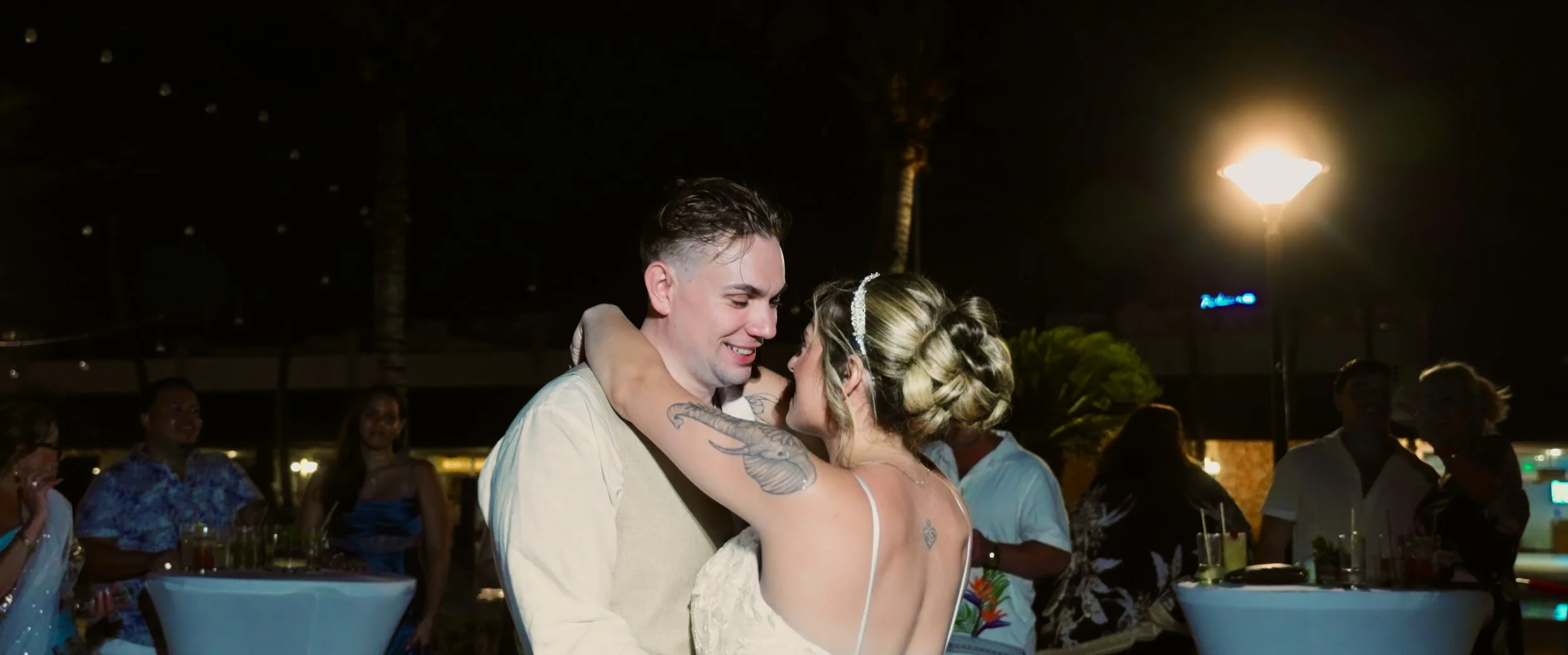 Aruba wedding couple Gianna and Daniel's first dance at their Holiday Inn Resort Aruba wedding reception at night