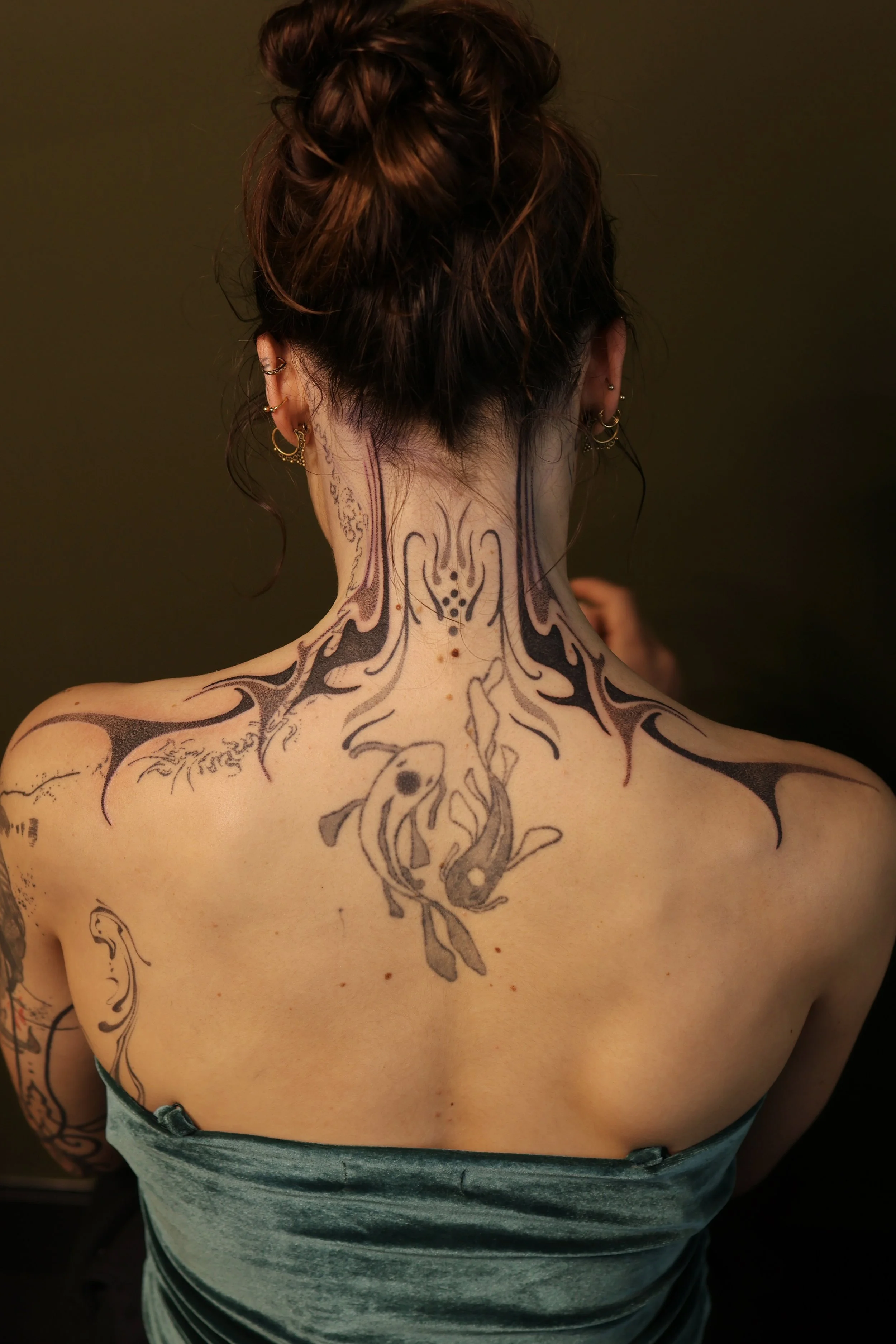 Artist: Kardia Ink— handpoked symmetrical neck tattoo
