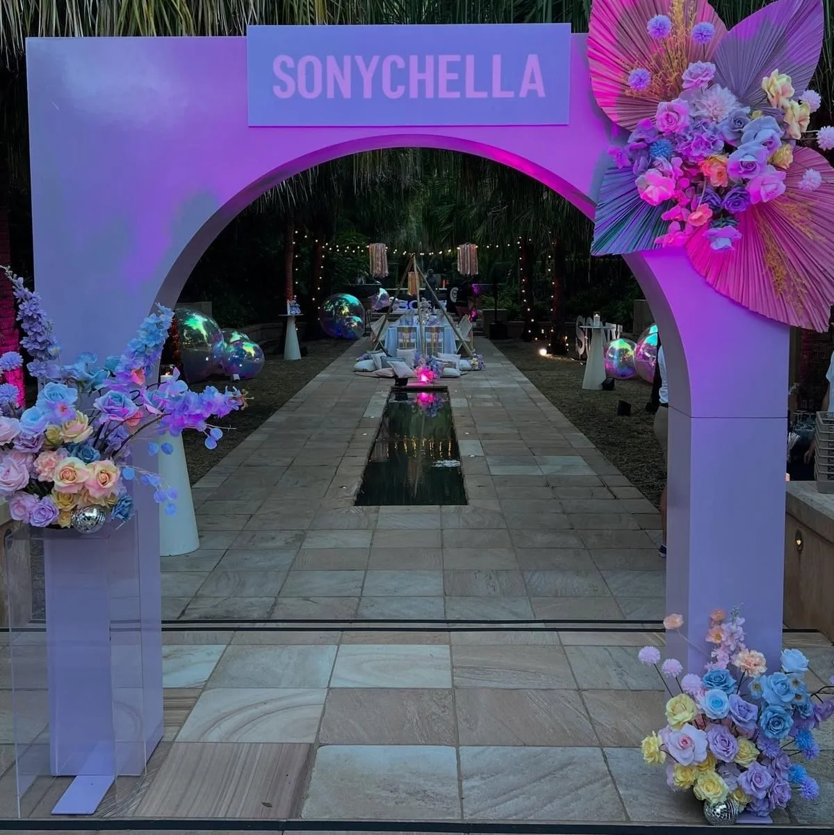 Sonychella colourful floral arch installation for a Sony event on Hayman Island