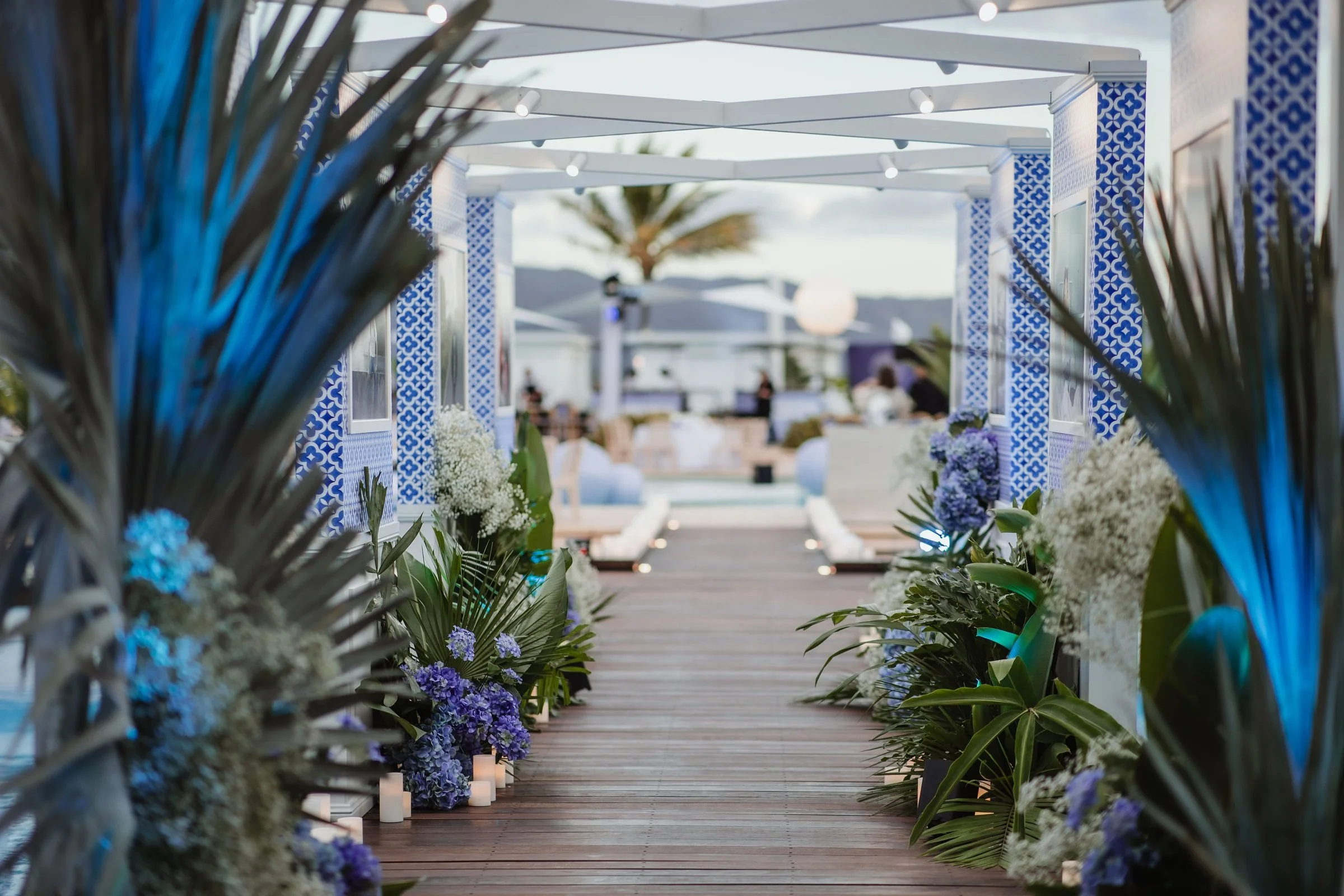 Custom-built tiled pergola walkway for a resort-style event