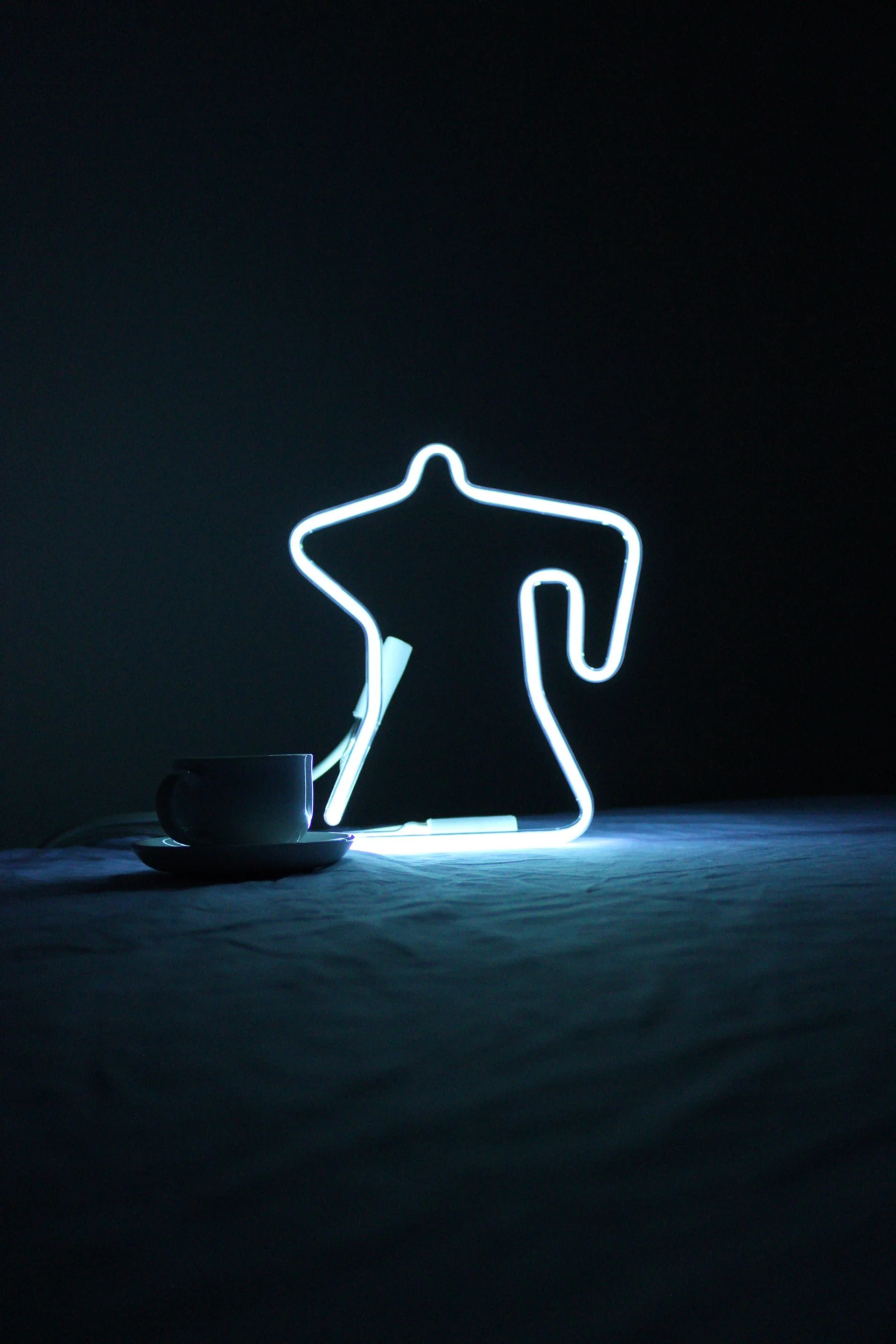 Bespoke glass neon sign for a Cardiff business interior