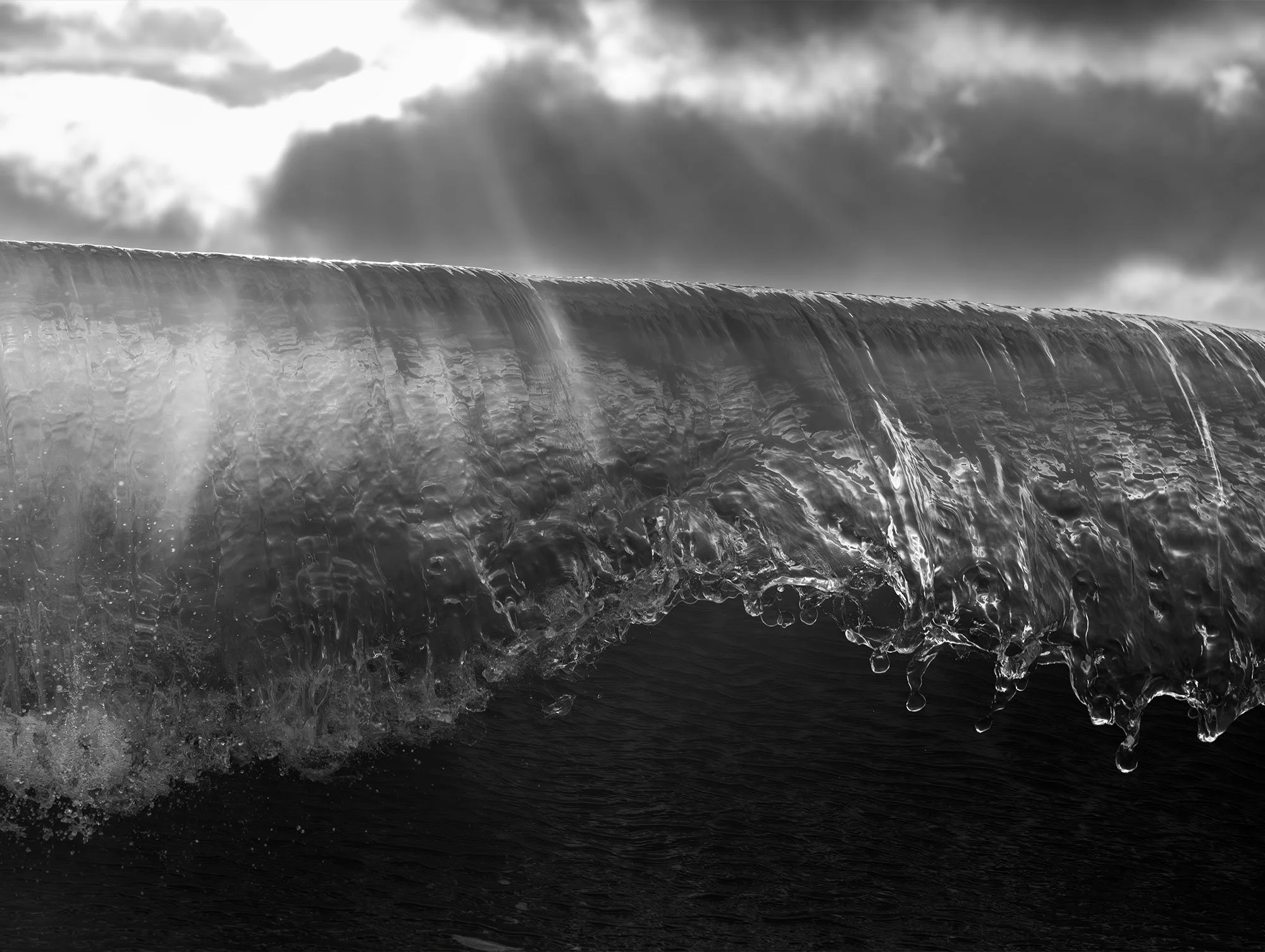 Black and white photo print showing a huge wave breaking close up