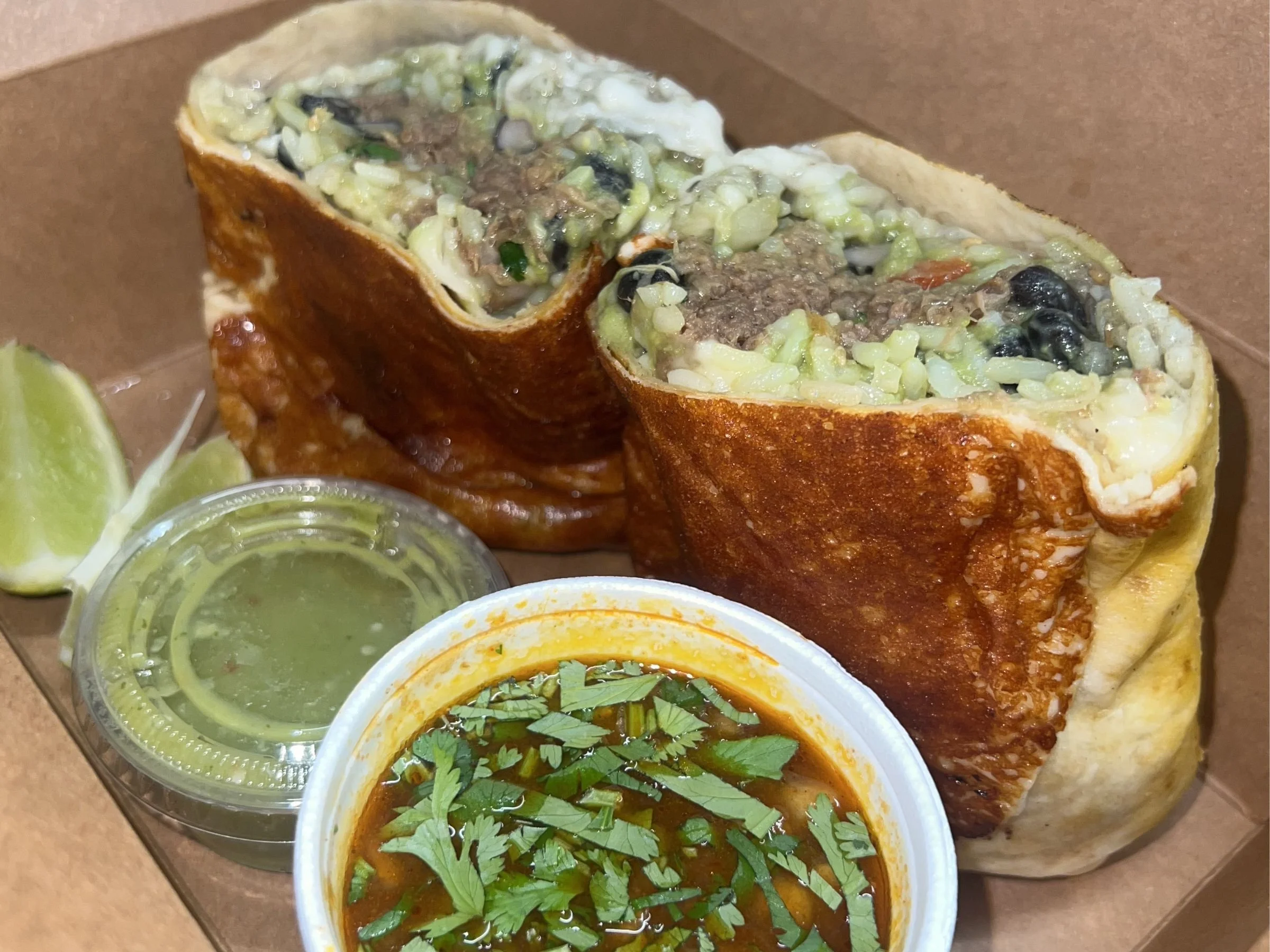 bulgogi beef birria burrito with dipping consommé