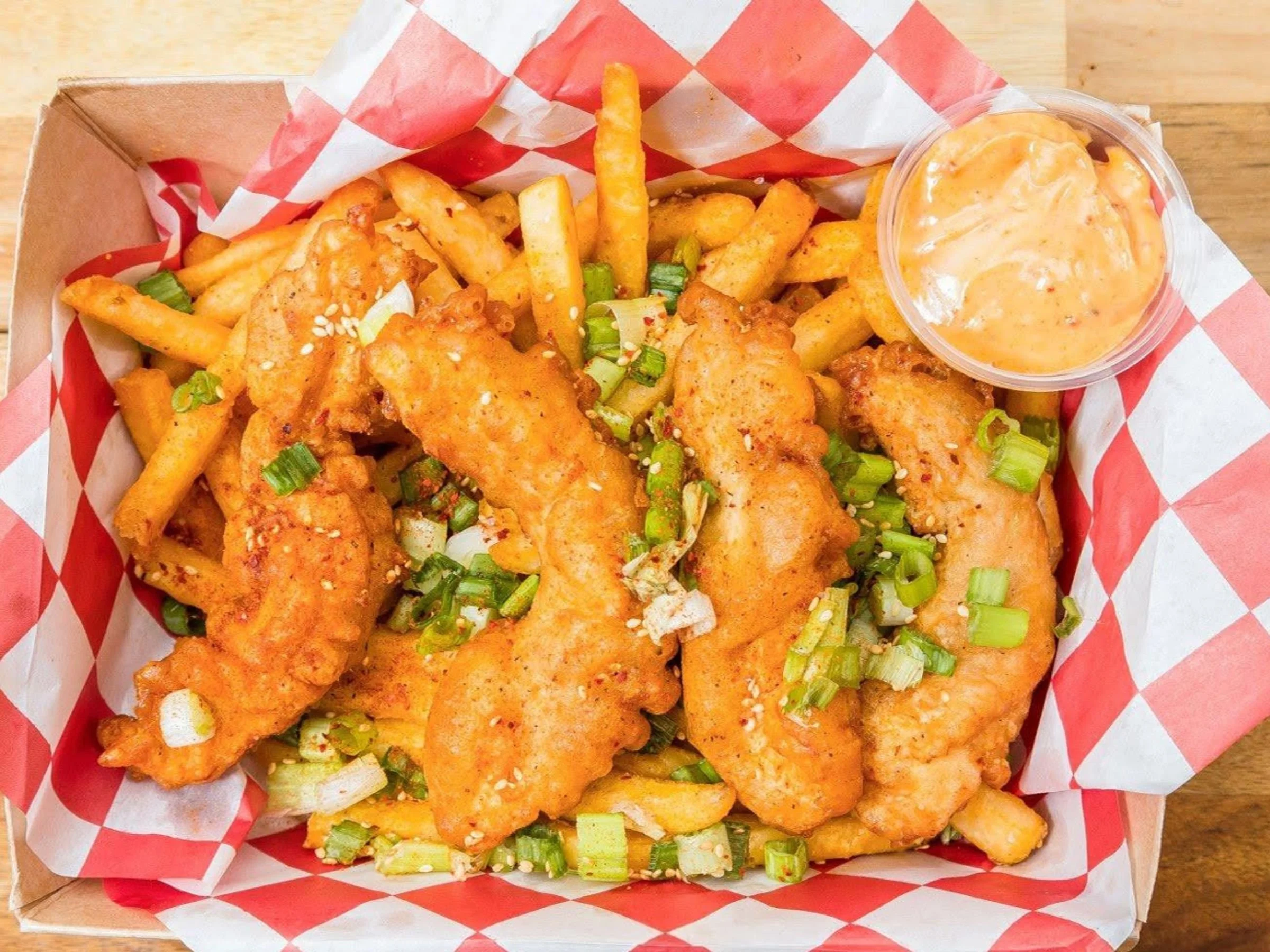 Crispy Korean fried Chicken tenders combo with crispy frieschicken sandwich with spicy sauce on toasted bun