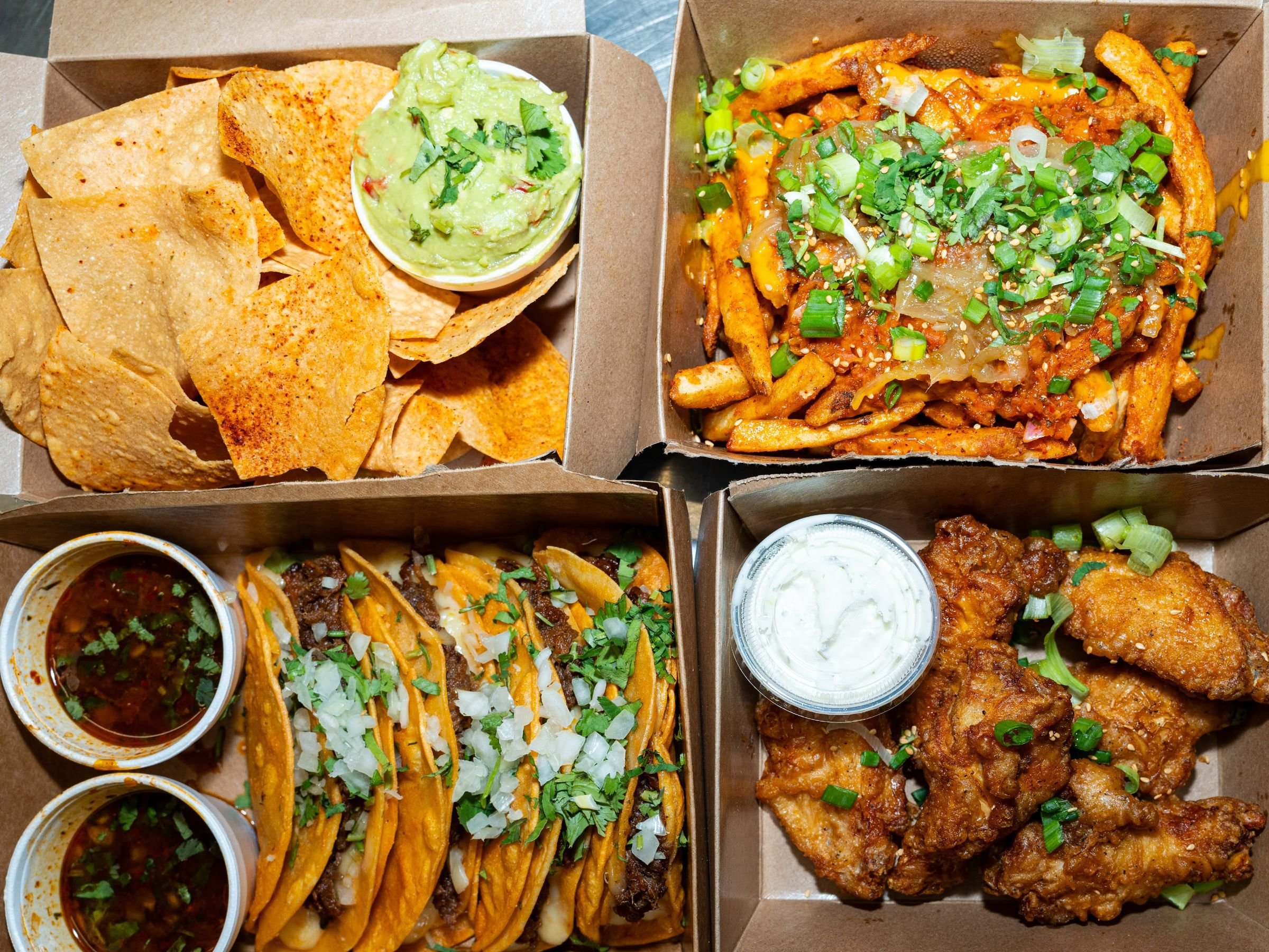 Sampler pack with tacos wings and sides Korea Taqueria