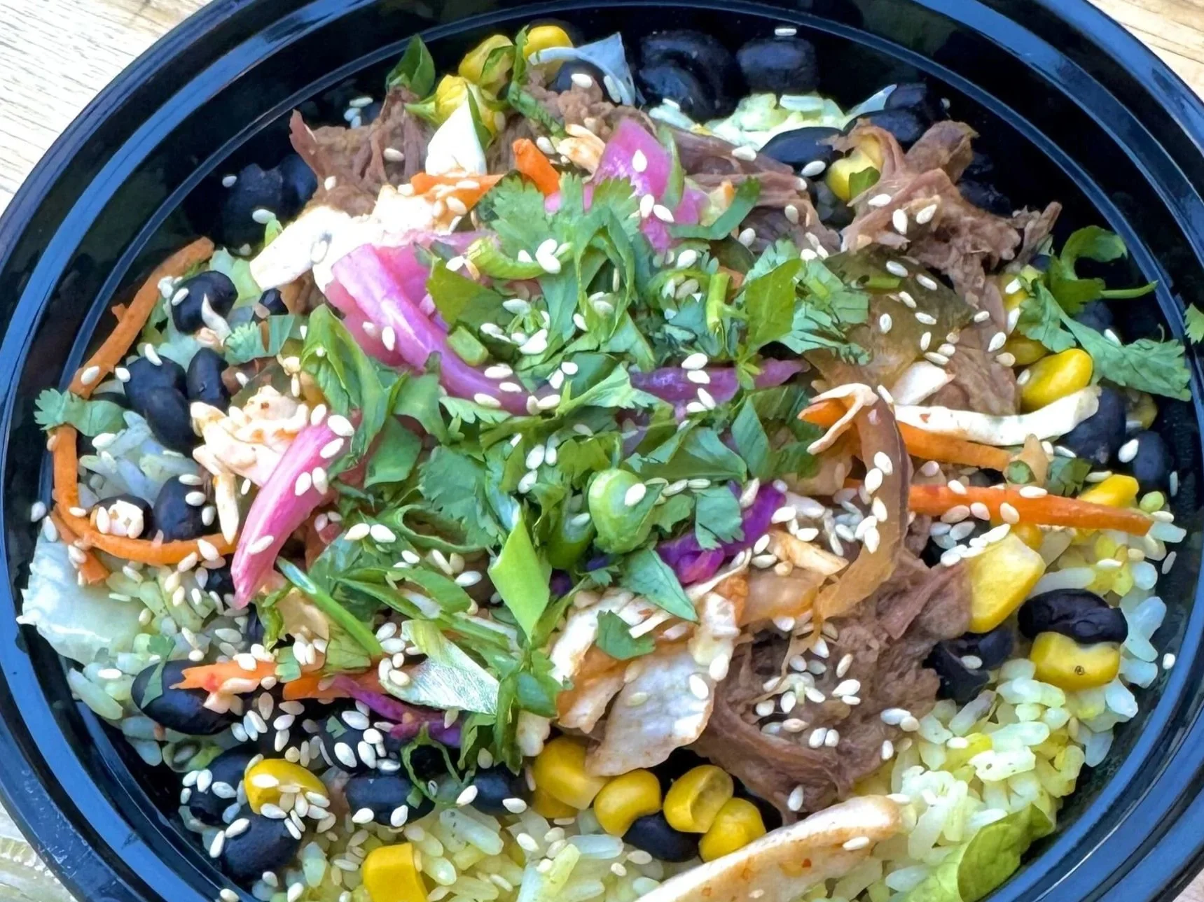 Custom Korean rice bowl with choice of protein and toppings
