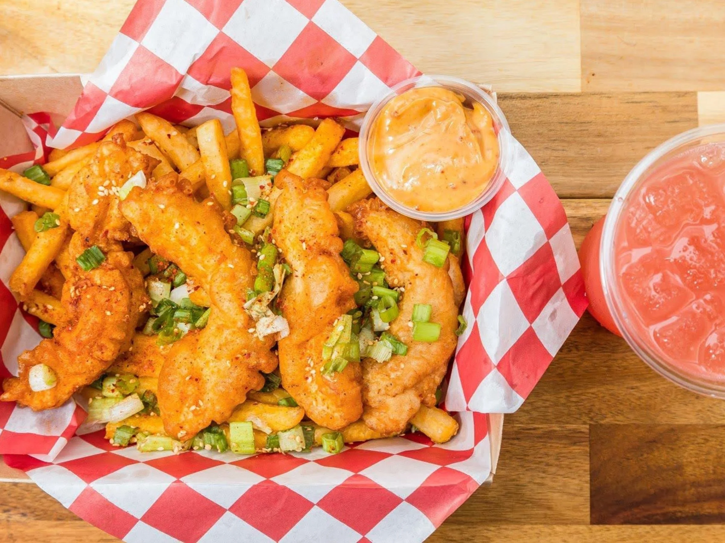 Chicken tenders meal with fries and watermelon agua fresca