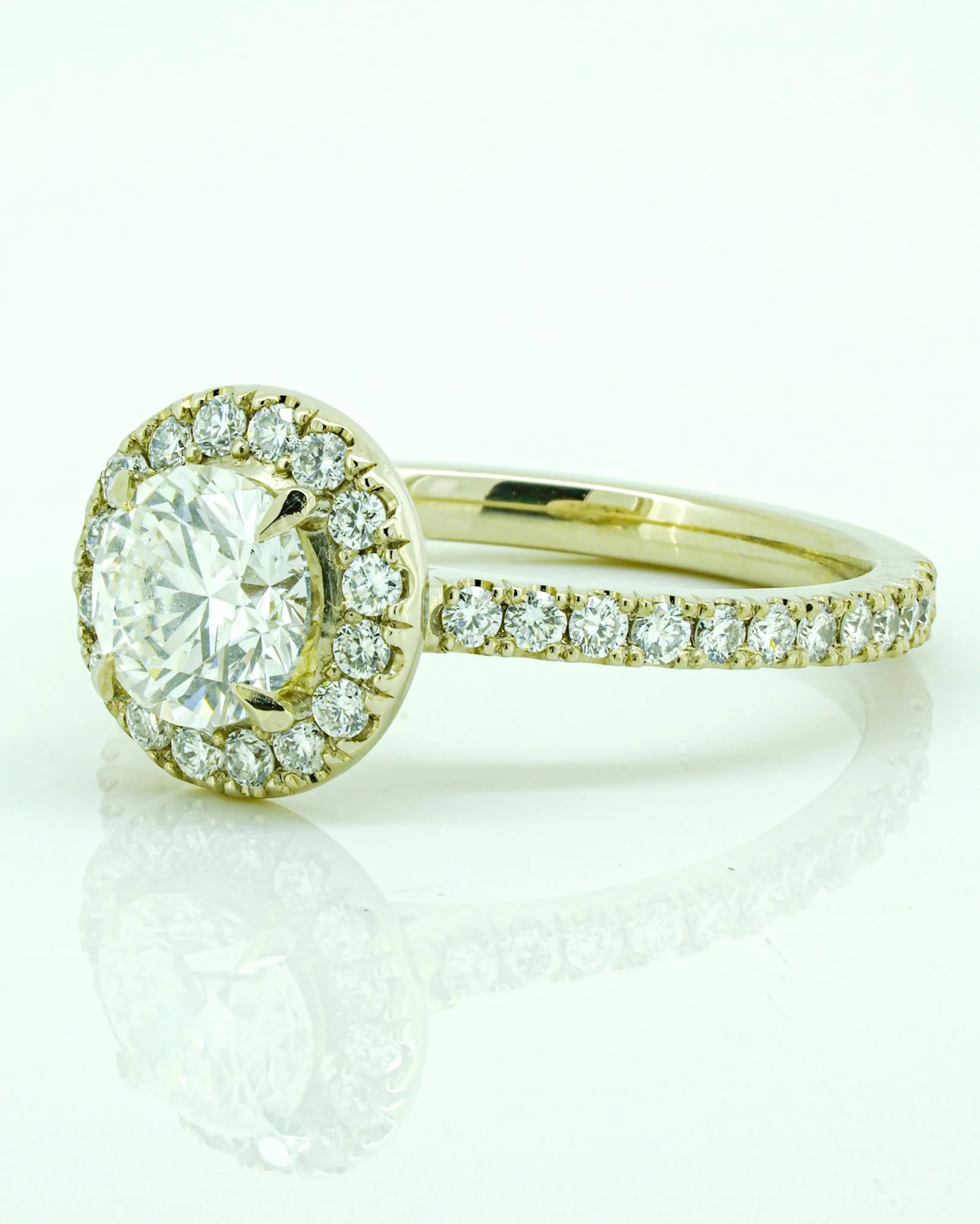 Handmade 14k palladium white gold engagement ring with diamond halo and diamond shoulders by Rings by NK