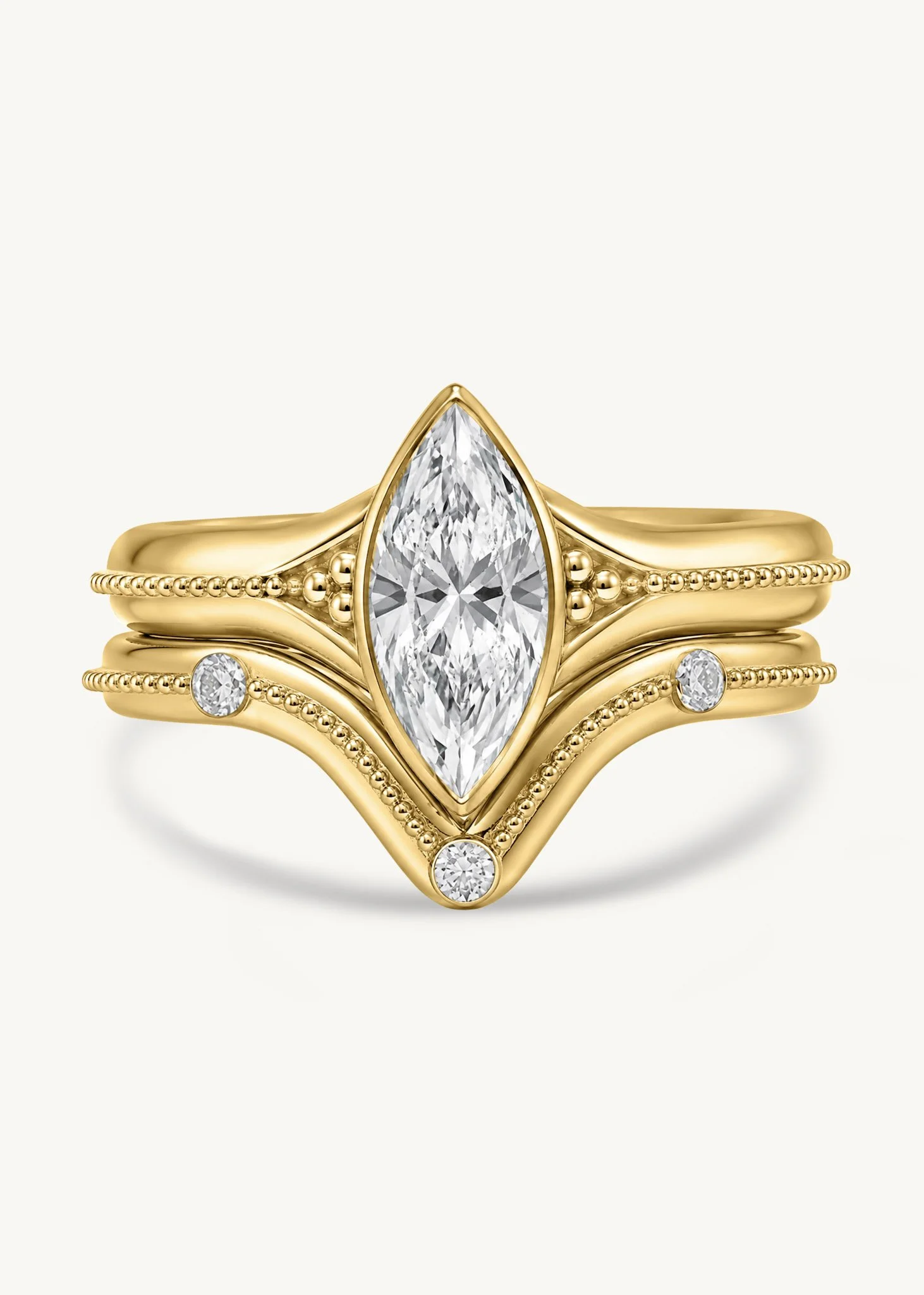 Handmade 18k gold marquise diamond Signature Solitaire with fitted diamond wedding band and fine granulation by Rings by NK.