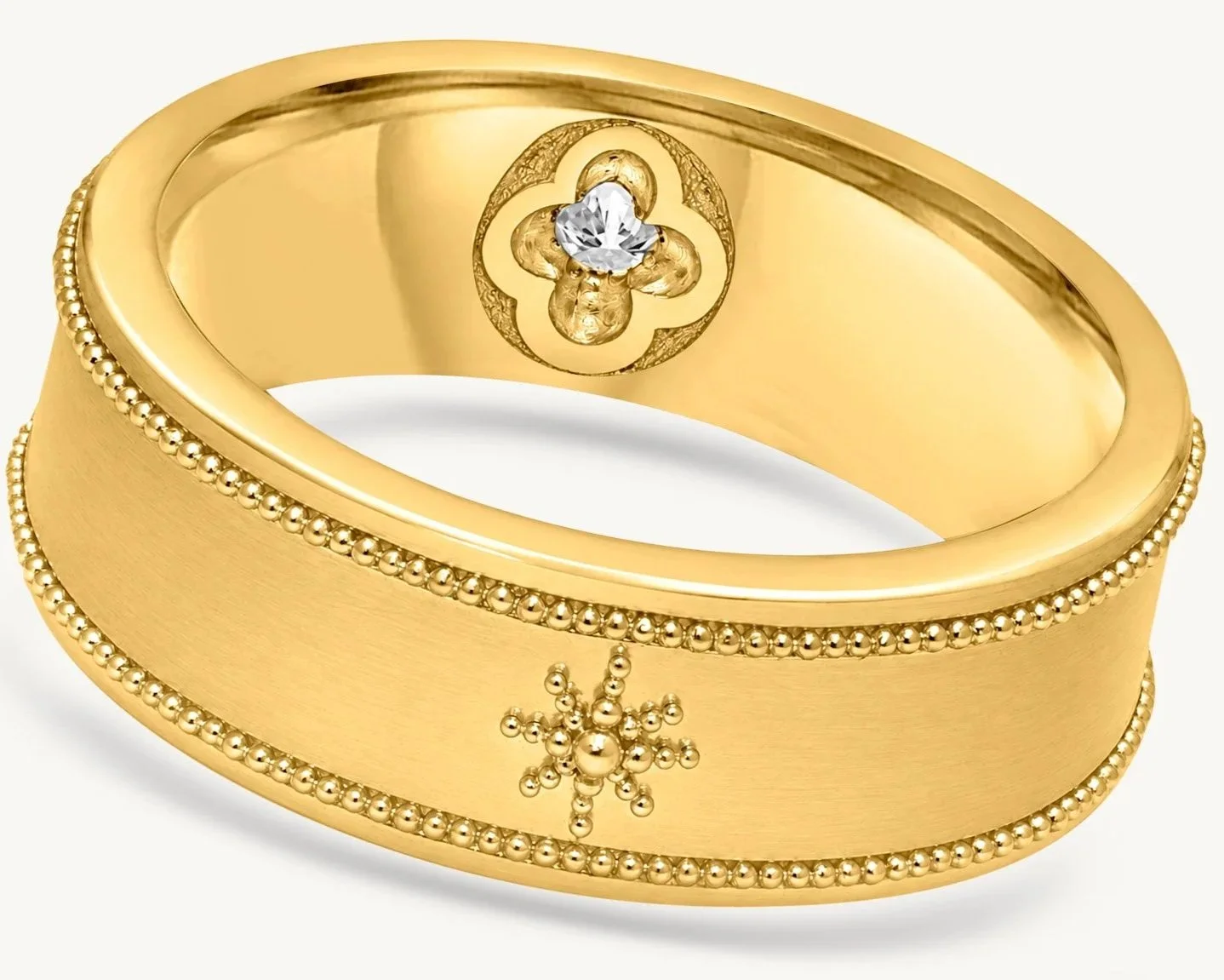 Handmade 18k yellow gold Philippine Sun band with two rows of fused gold granulation and engraved sun detail.