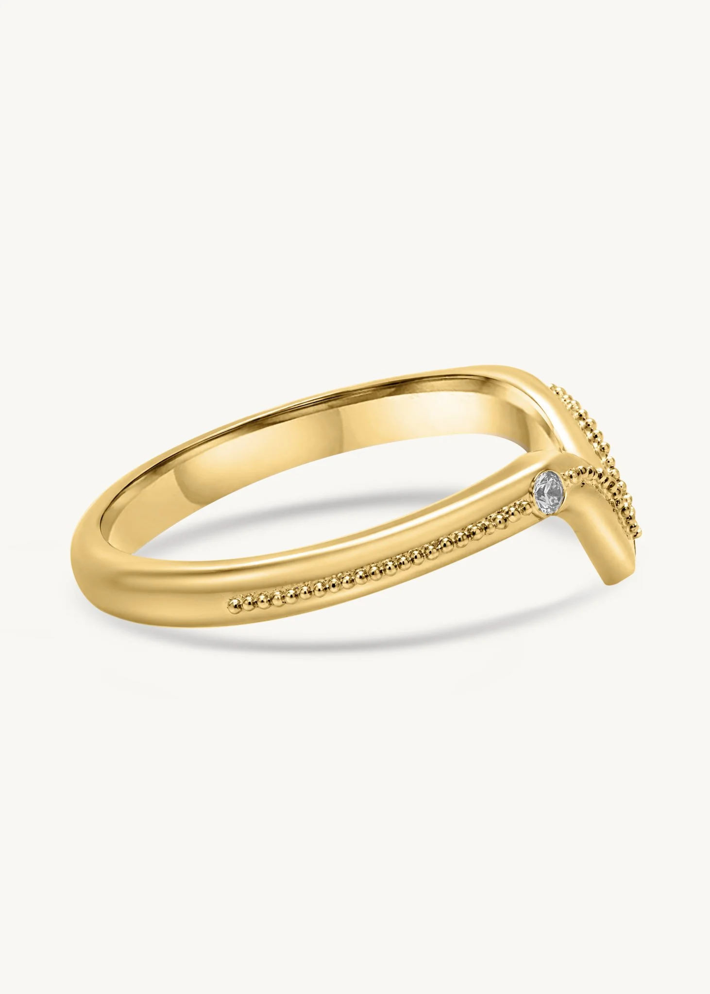 Handmade 18k gold fitted wedding band with sculpted curve and fine granulation by Rings by NK.