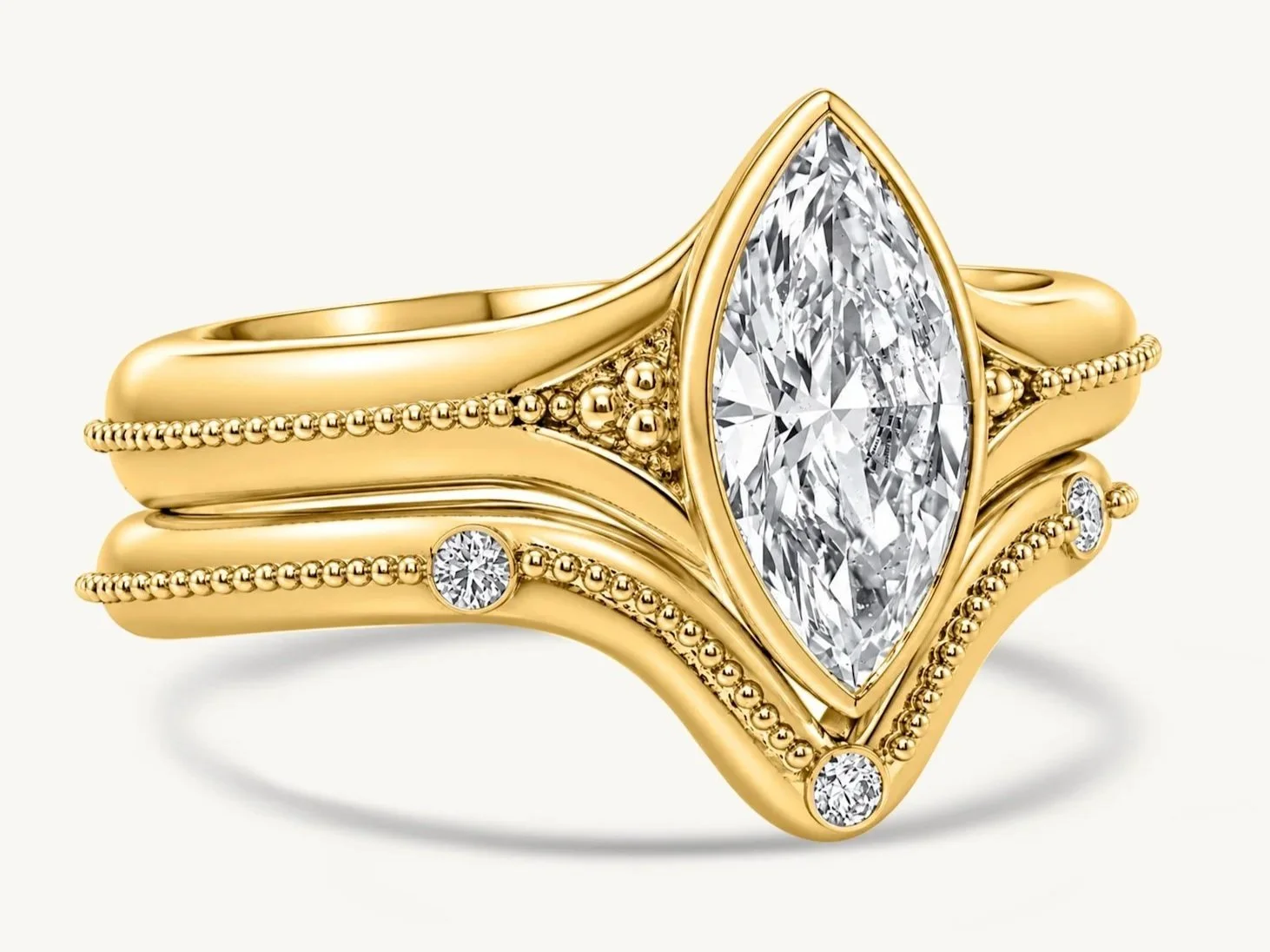 Handmade 18k gold marquise diamond Signature Solitaire with fitted wedding band and fine granulation by Rings by NK.