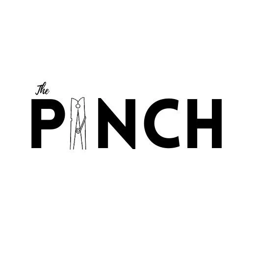 The word "PINCH" with a clothespin as the letter "I." for The Pinch Journal, literary magazine