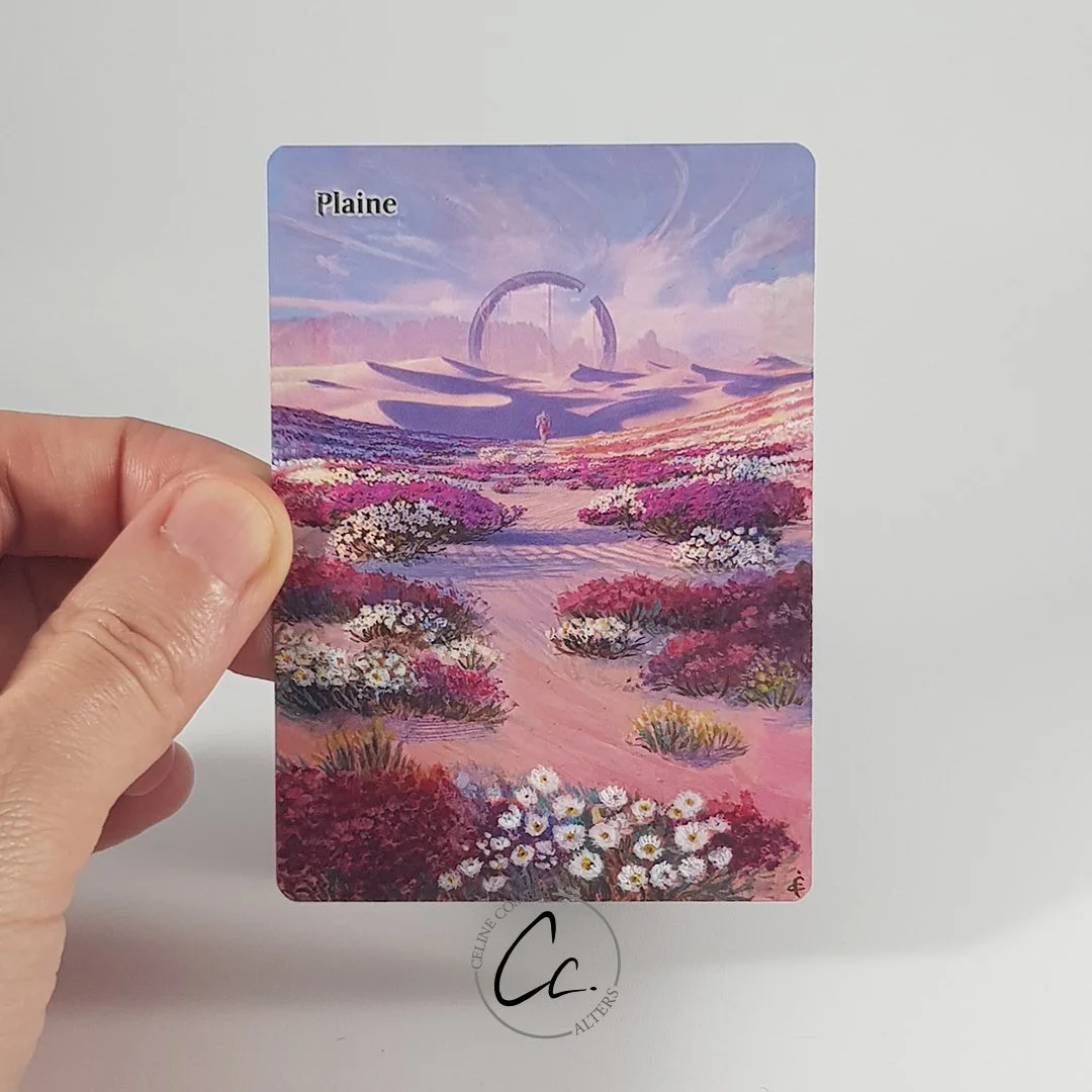 Fantasy landscape with pink dunes, colorful bushes, a pathway, a distant figure, and futuristic structures under a vibrant sky.